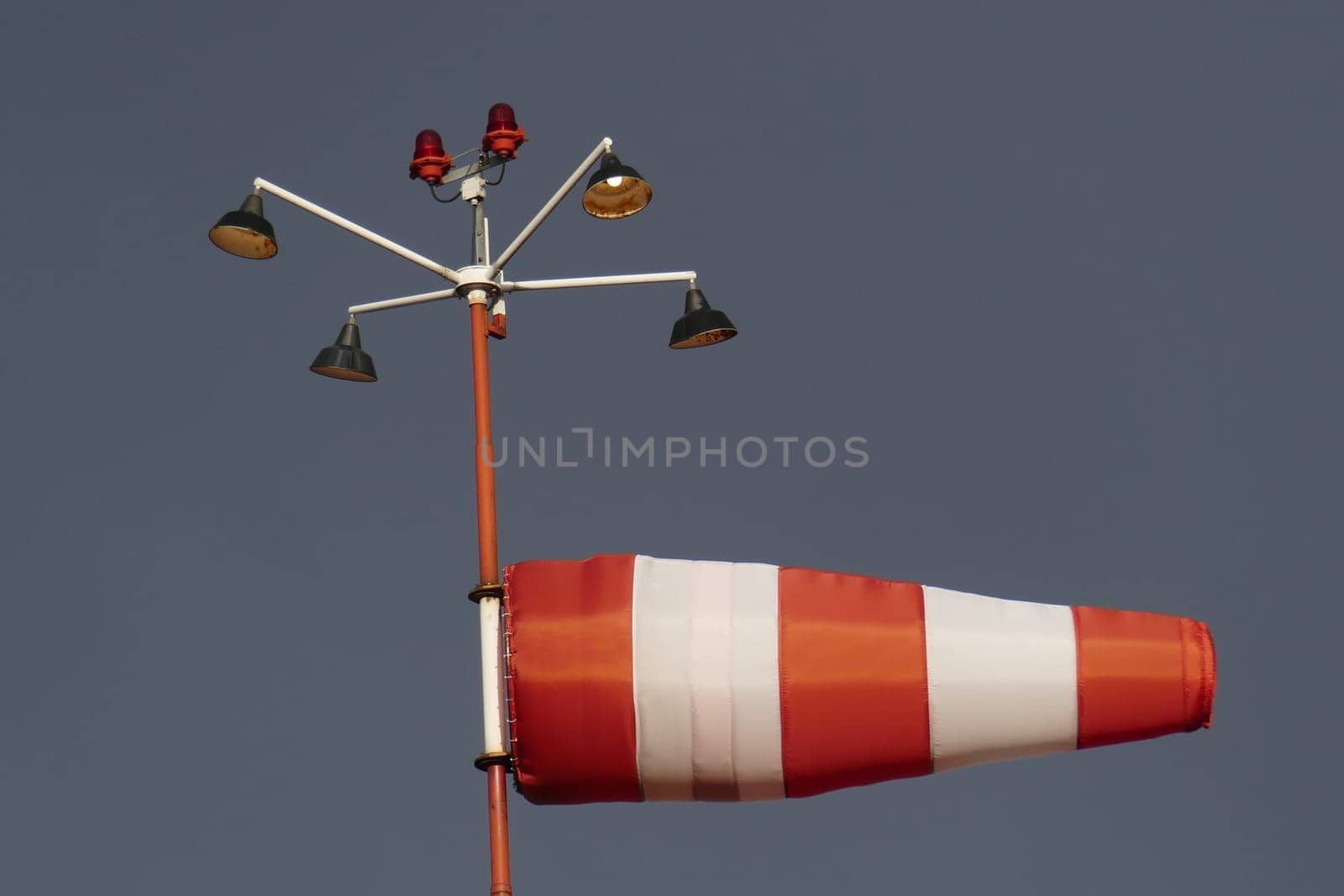 Airbag, windsock, wind vane, dark cloudy sky, Germany, Europe