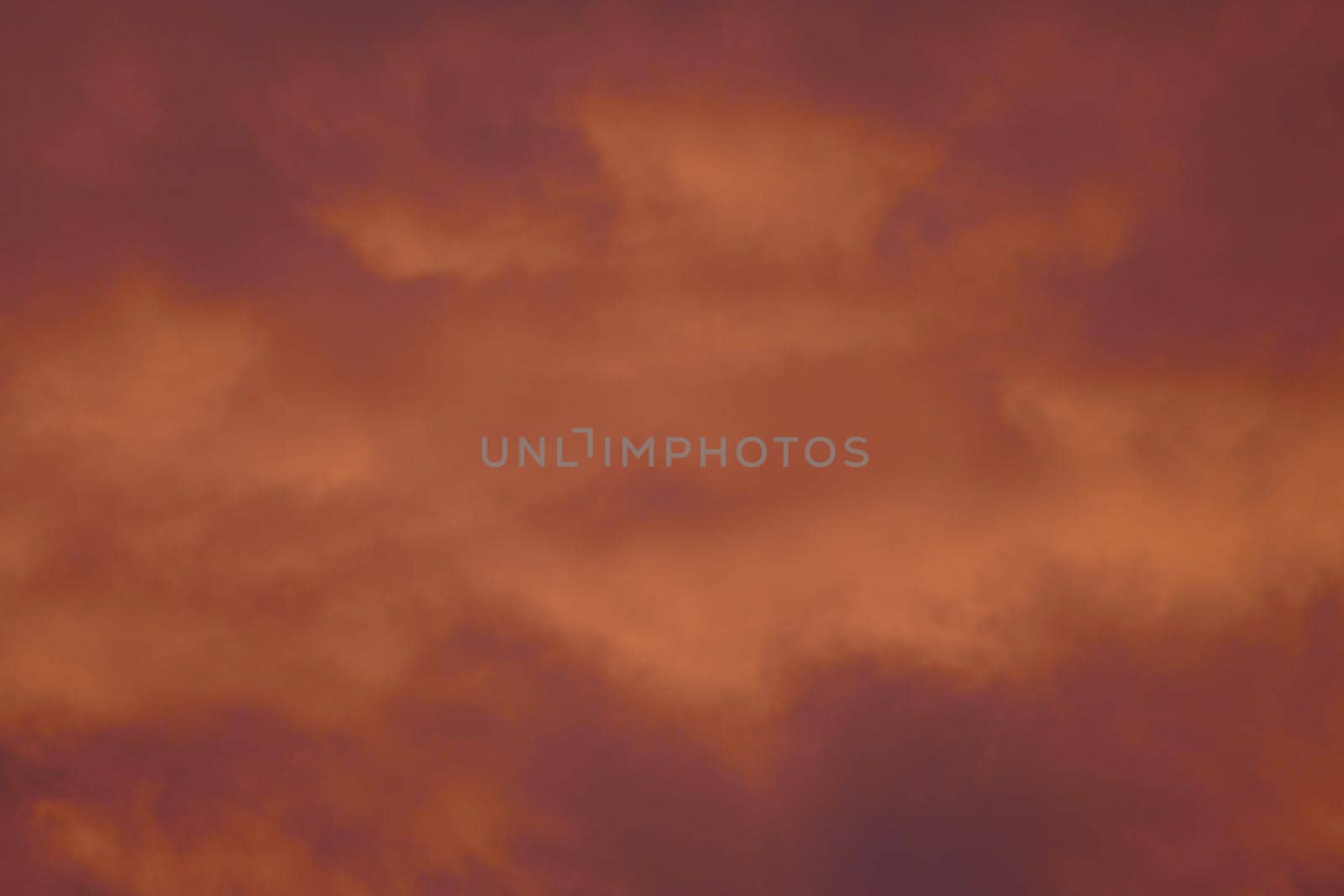 Fire-red lightly clouded sky, sunset, background