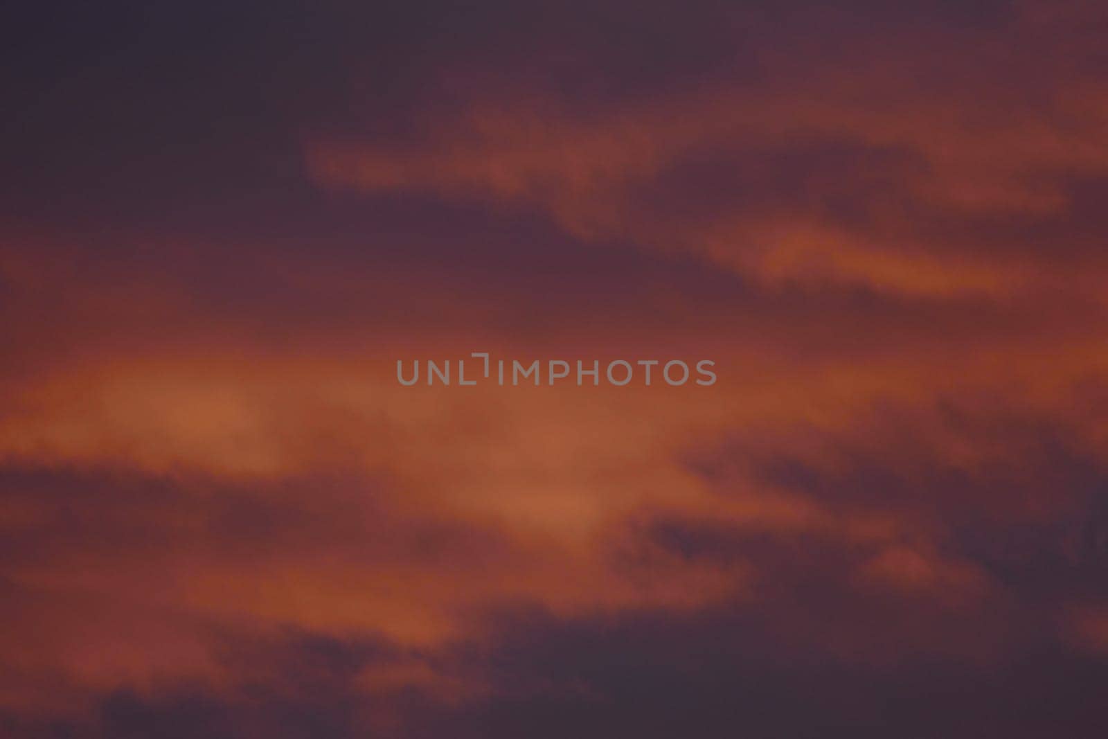 Fire-red lightly clouded sky, sunset, background