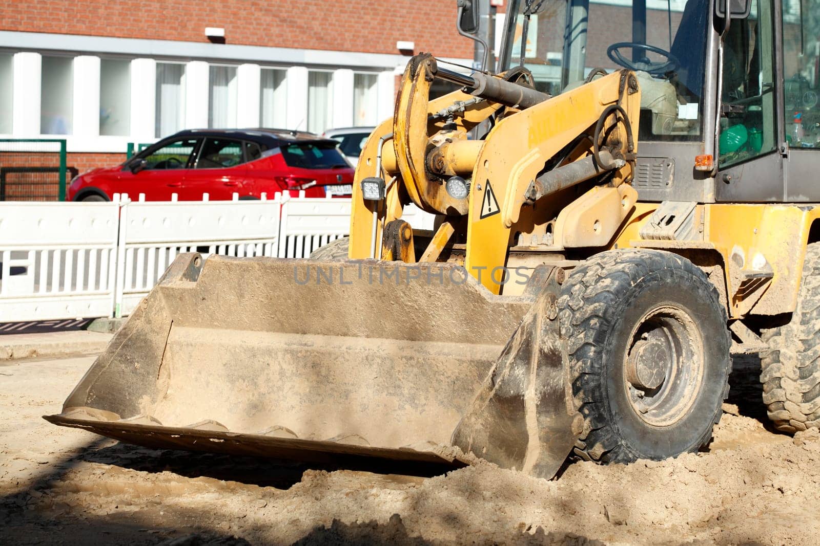 Excavator with excavator bucket on a construction site
