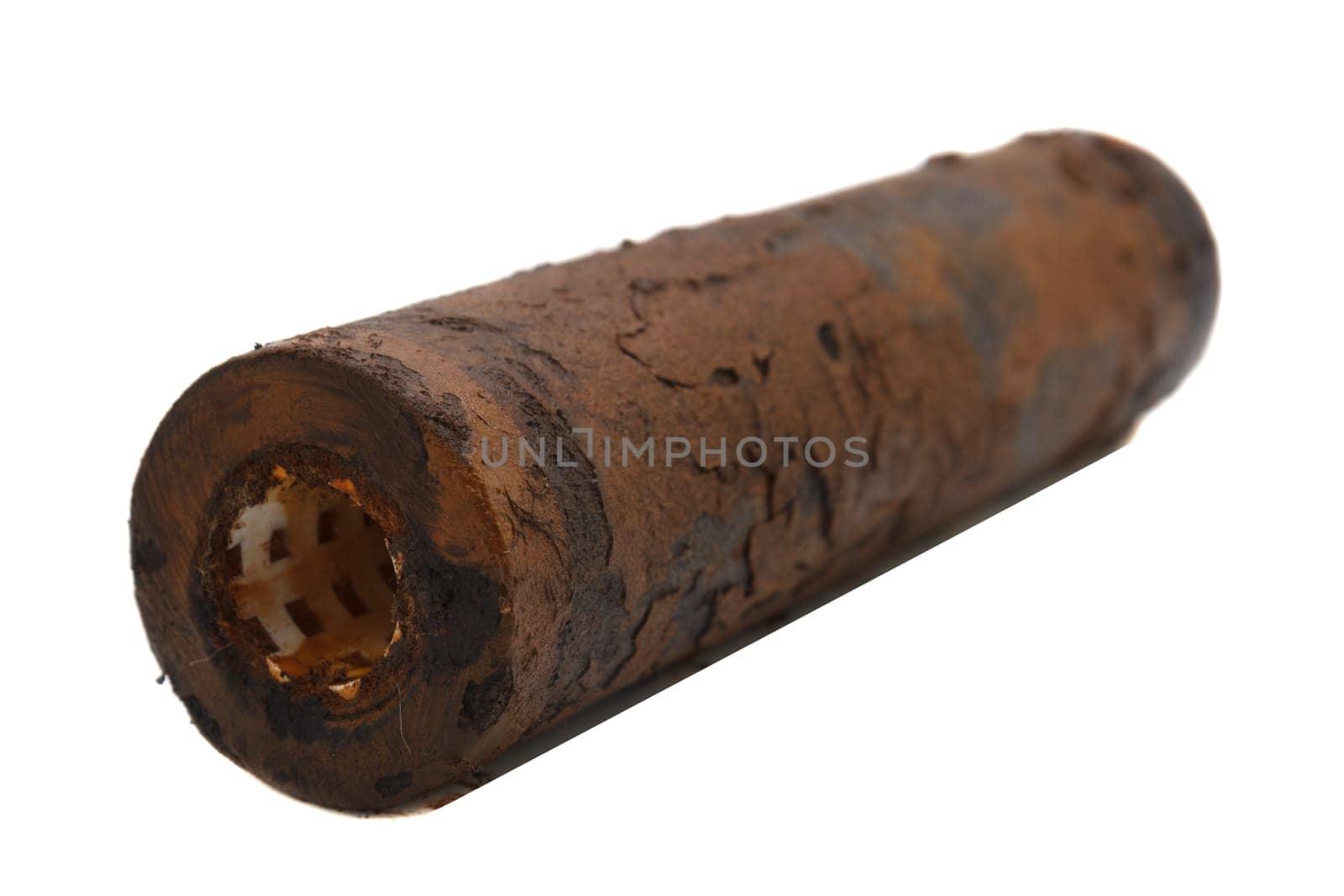very dirty rusty water filter on white background