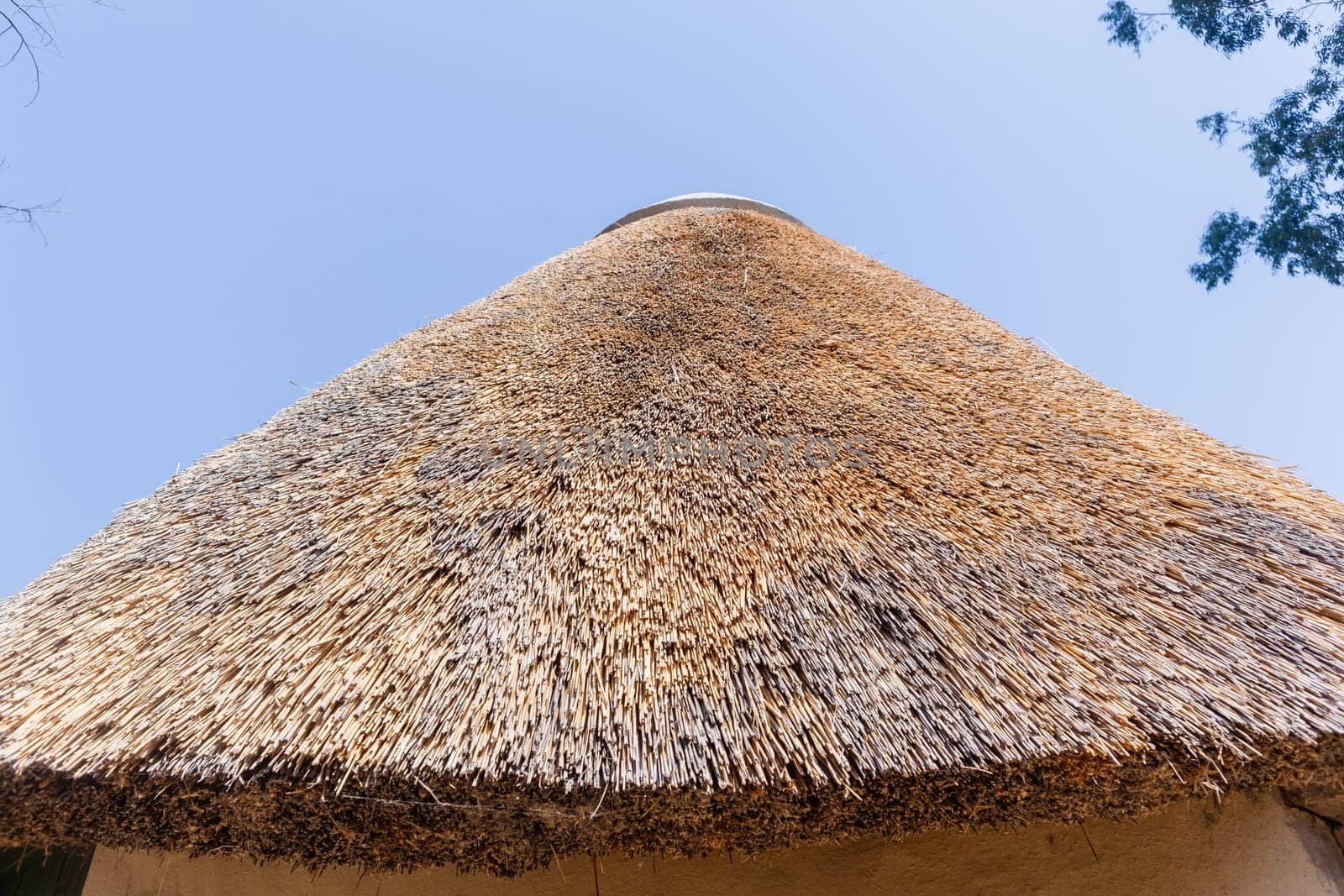 African style thatch grass  roofs round bungalow cottages buildings  holiday camps in rural mountains.