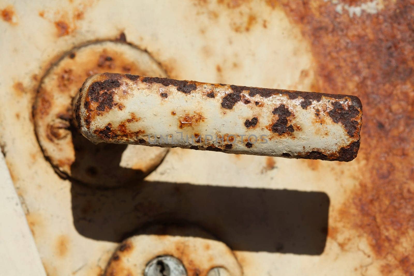 Old rusted metal door handle, Germany, Europe