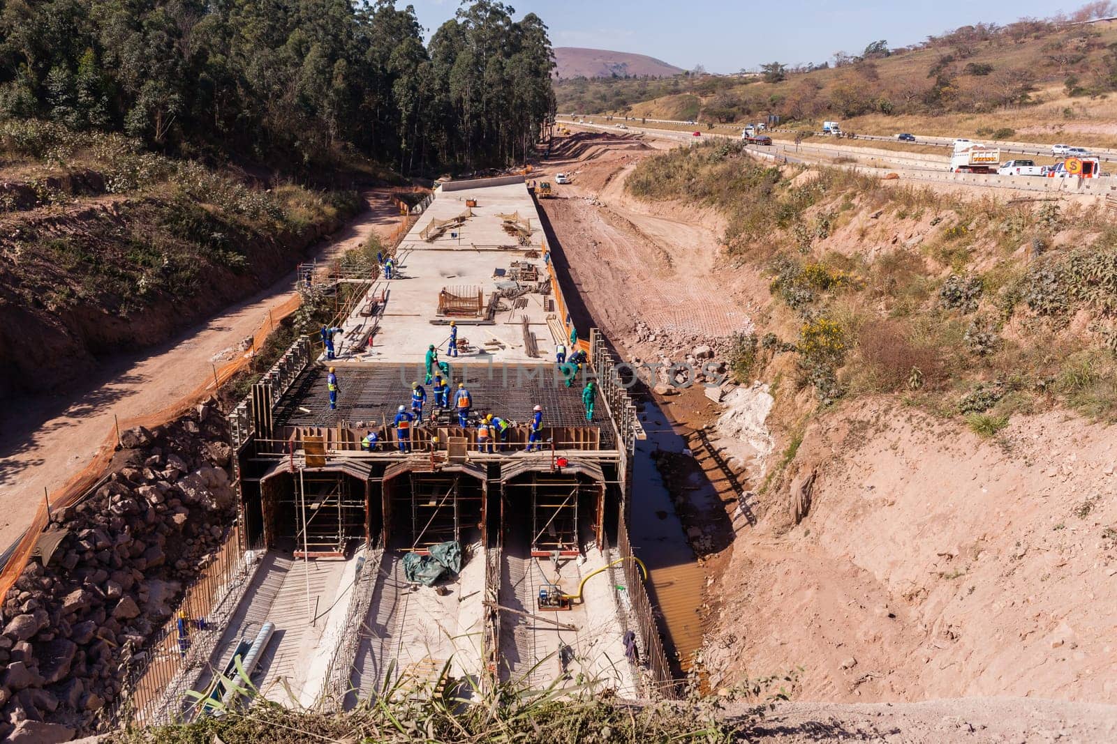 Constructionindustrial building of new road highway rain flooding water tunnels  halfway progress.