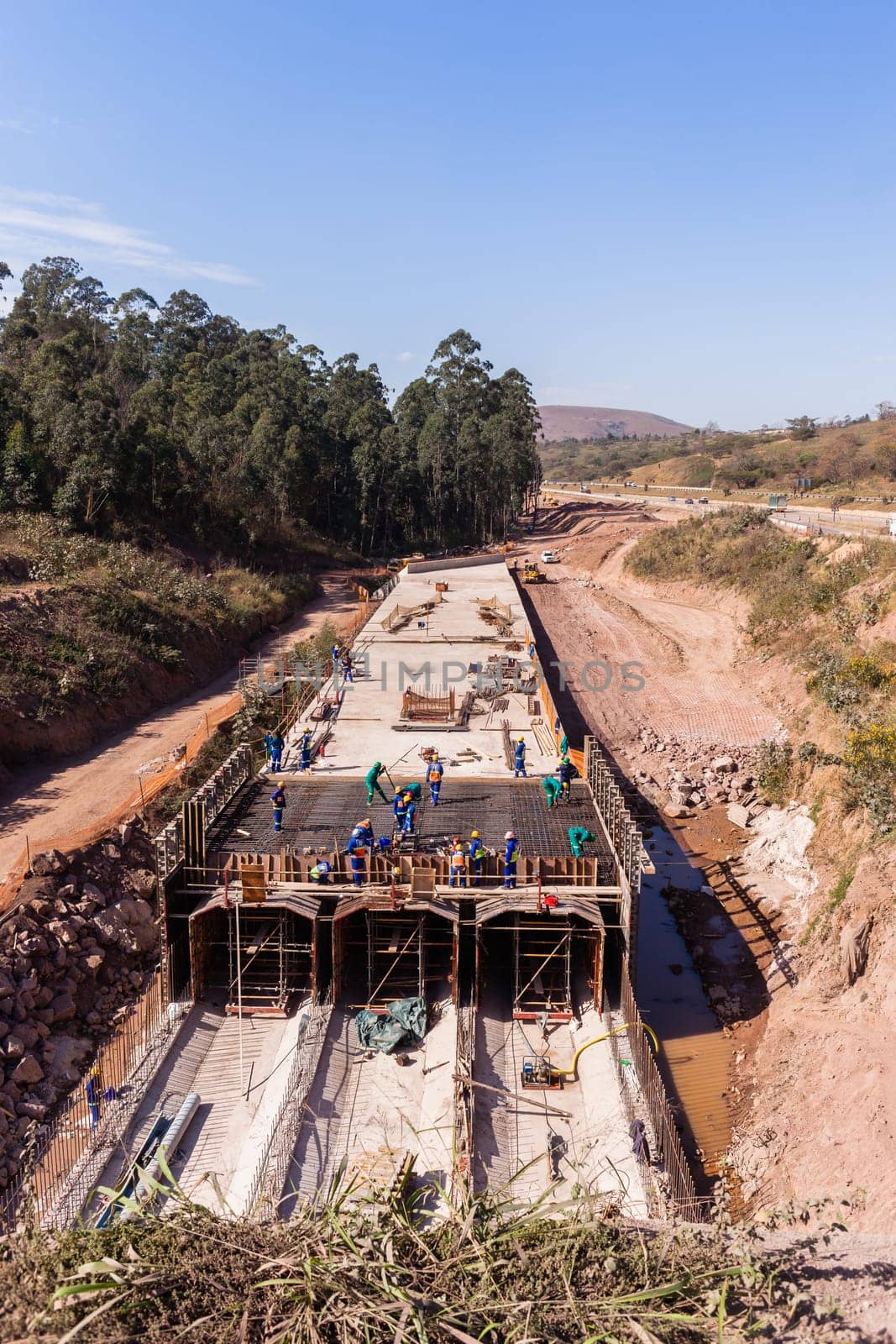 Constructionindustrial building of new road highway rain flooding water tunnels  halfway progress.