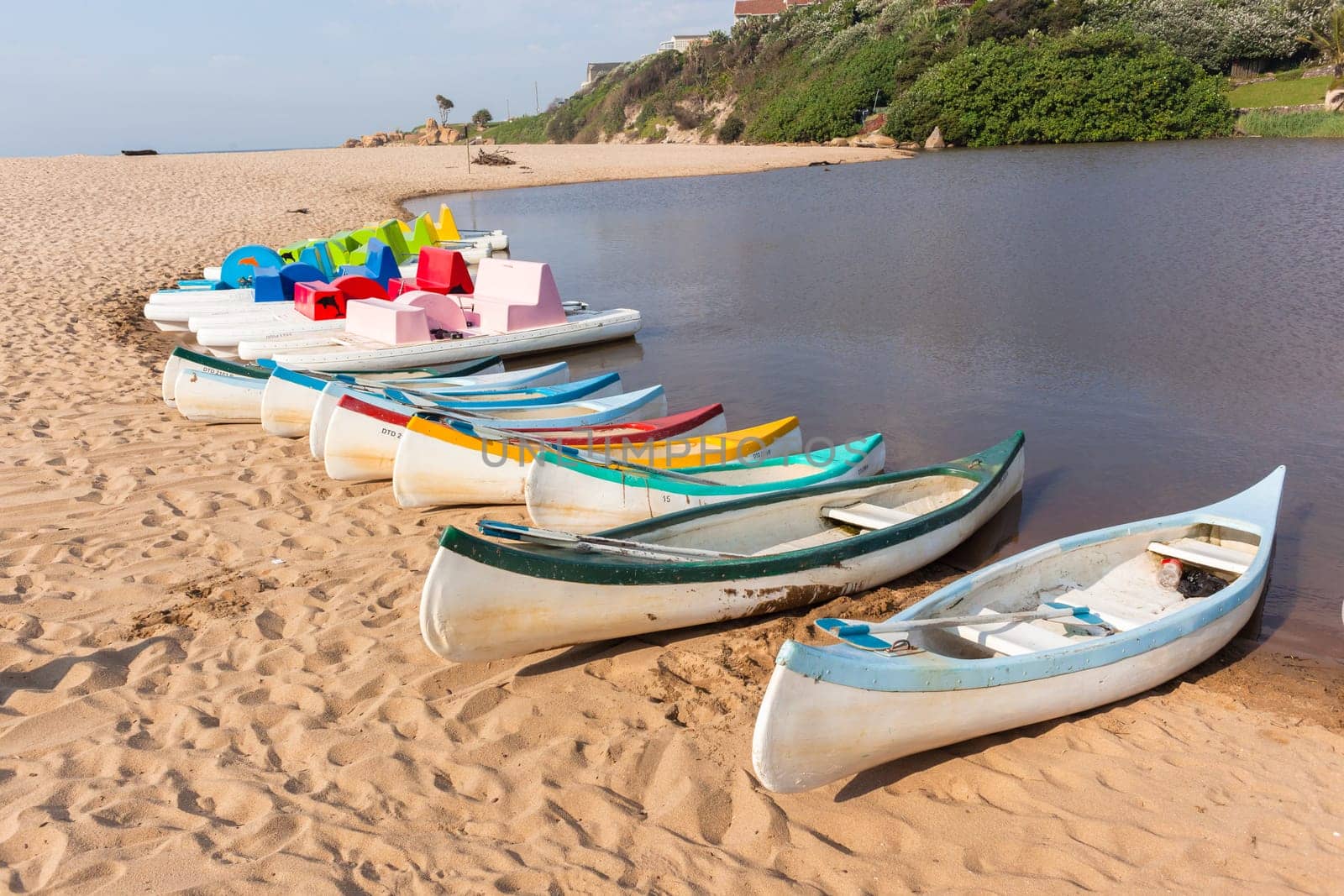 Scenic destination beach river lagoon paddle boats holiday apartments at Ramsgate South-Africa