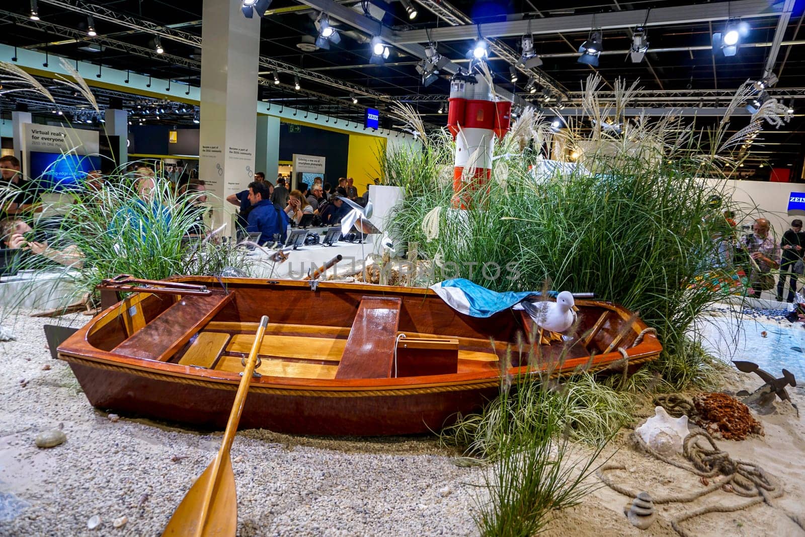 COLOGNE, GERMANY - SEPTEMBER 21, 2016: Photokina Exhibition interior. The Photokina is the world's largest trade fair for the photographic and imaging industries. Zeiss stand in the Photokina Exhibition.