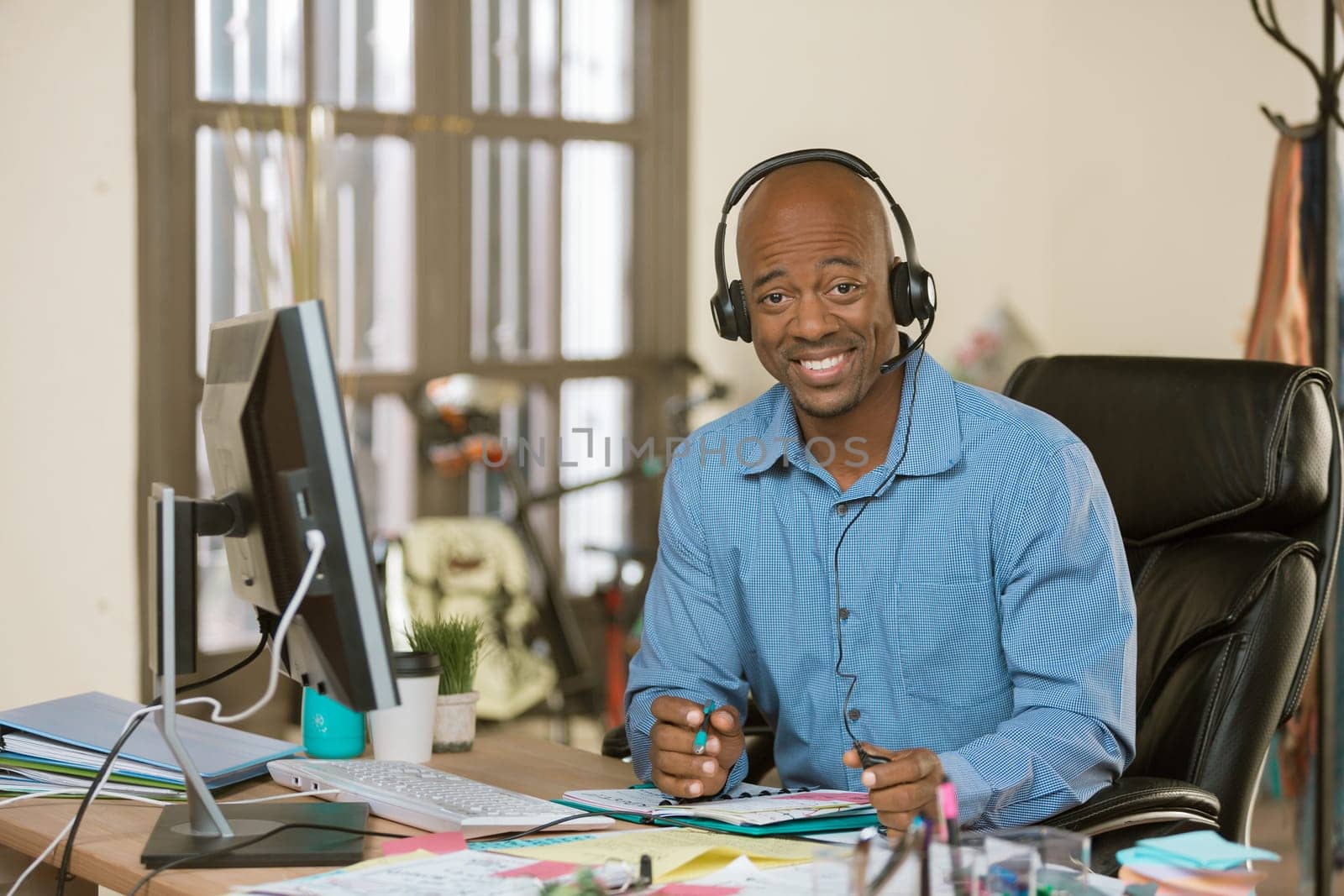 Handsome professional man wearing a headset