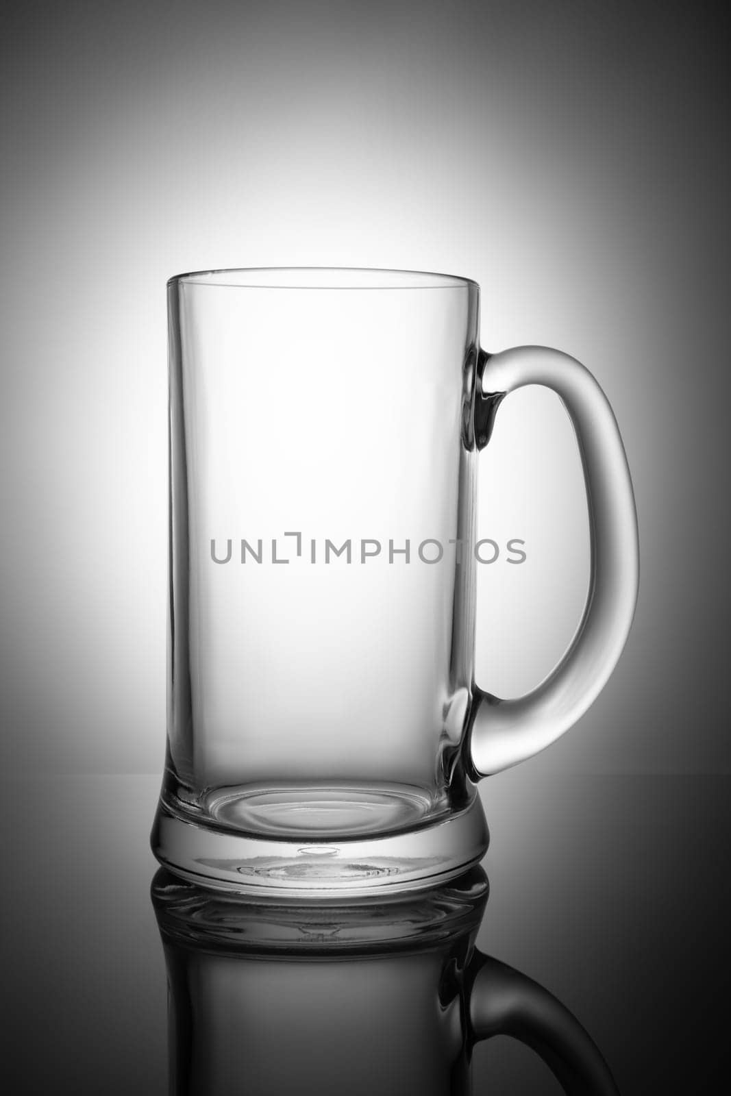 Empty beer mug, isolated on white background.