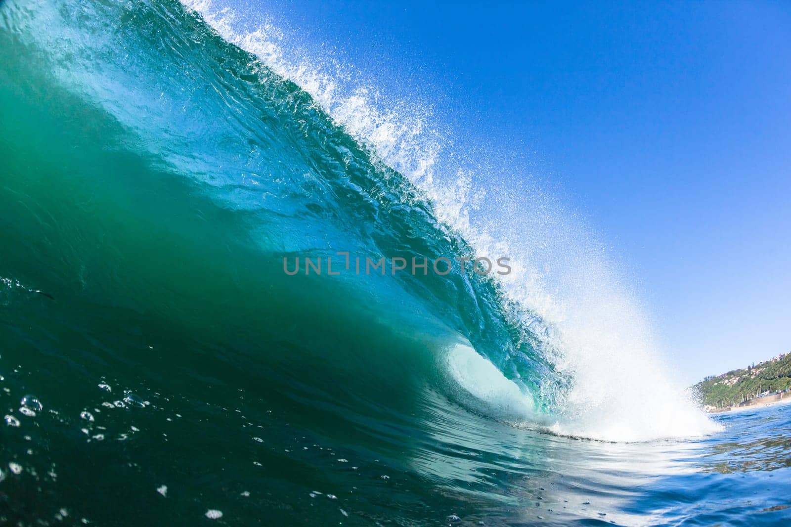 Ocean swimming closeup encounter water photo inside hollow crashing wave.