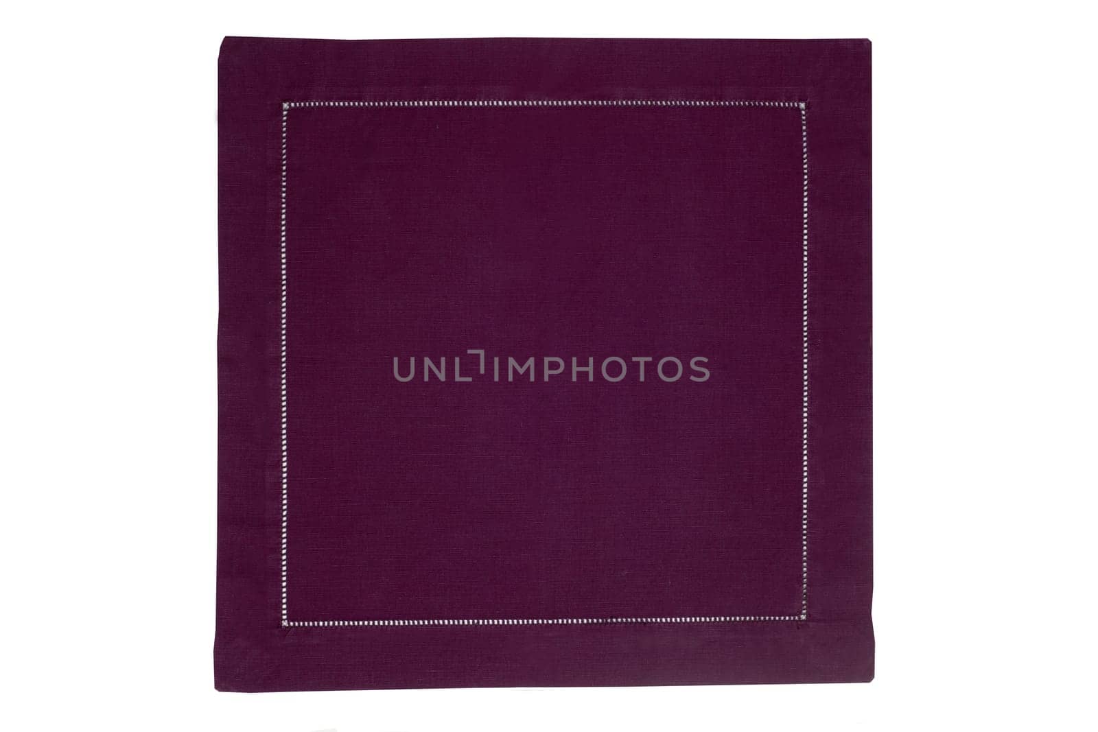 Closeup of a violet napkin or tablecloth isolated on white background. Kitchen accessories.