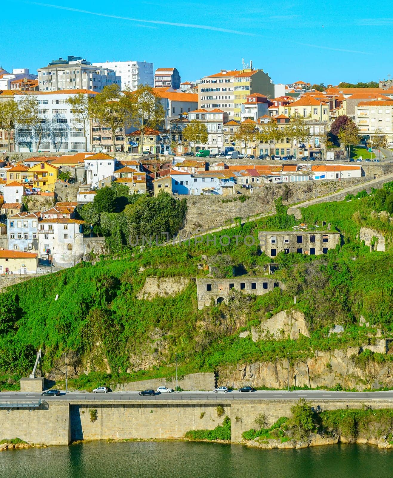 View of Porto architecure by Douro river in bright sunny day, Portugal