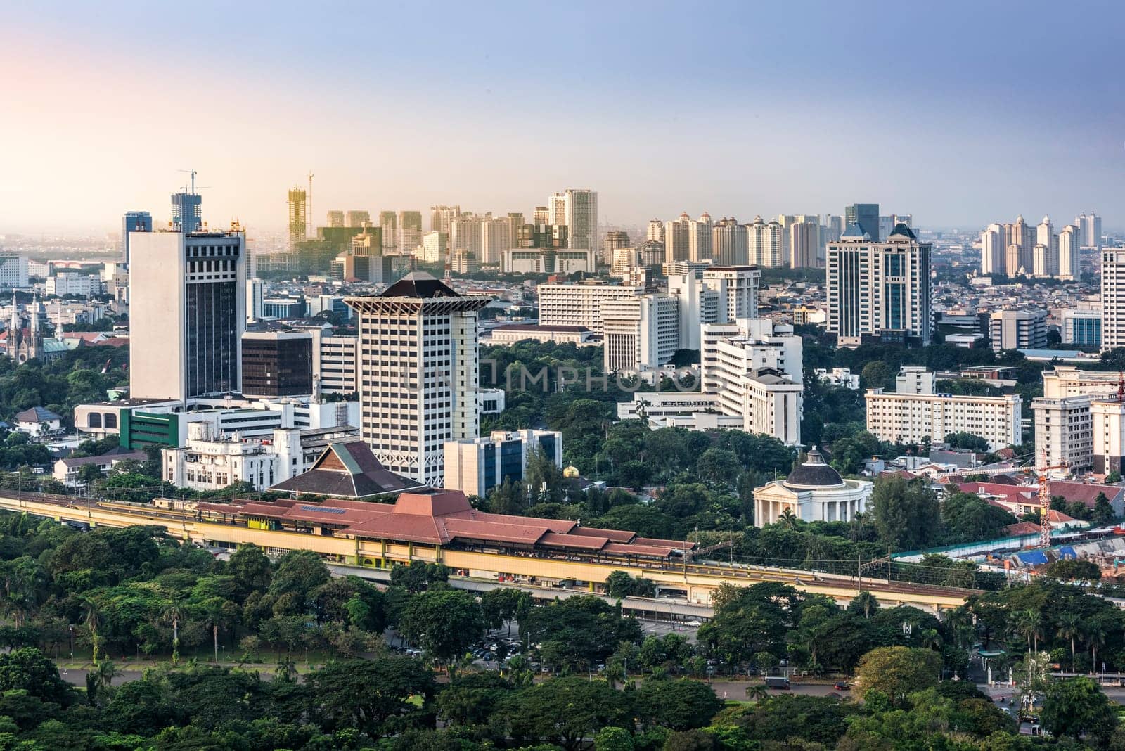 Jakarta city skyline with urban skyscrapers in the afternoon. Jakarta, Indonesia