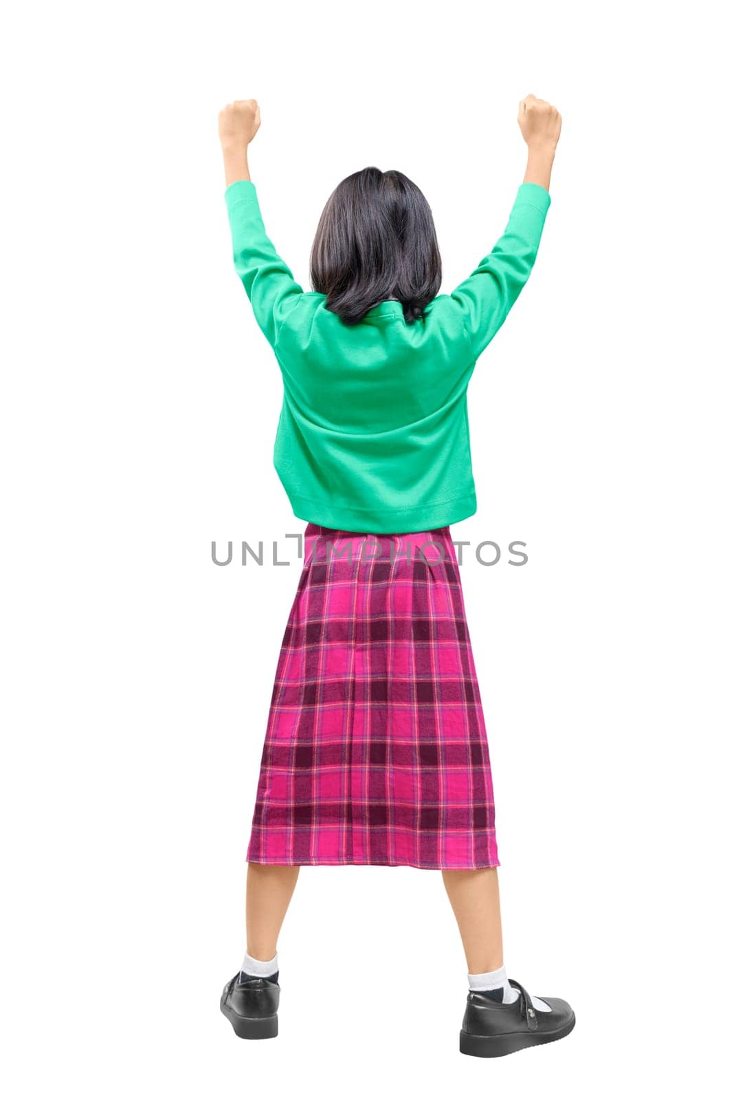Rear view of asian cute girl standing while raised arms posing isolated over white background. Back to School concept
