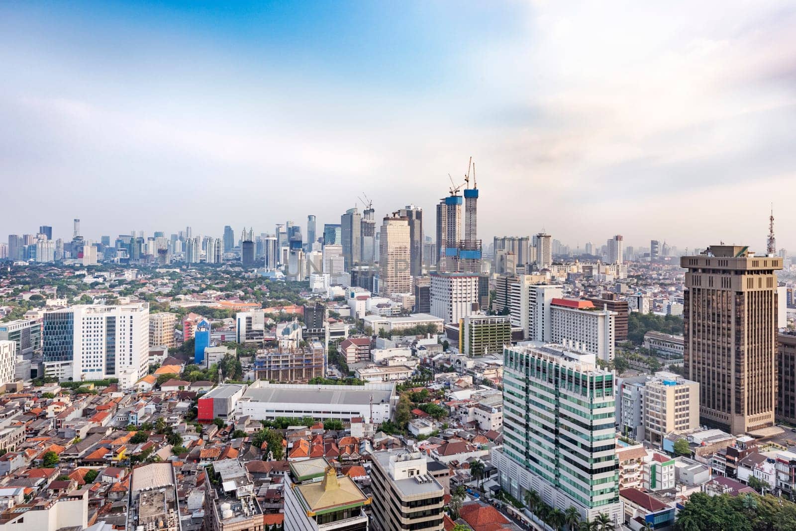 Jakarta city skyline with urban skyscrapers in the afternoon. Jakarta, Indonesia