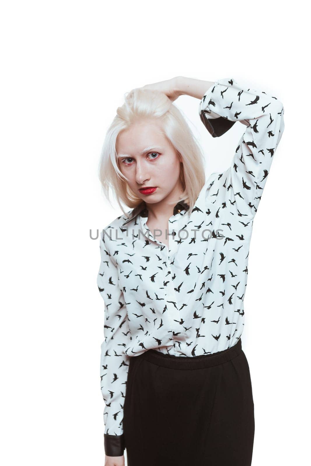 portrait blonde albino girl in studio on white background.