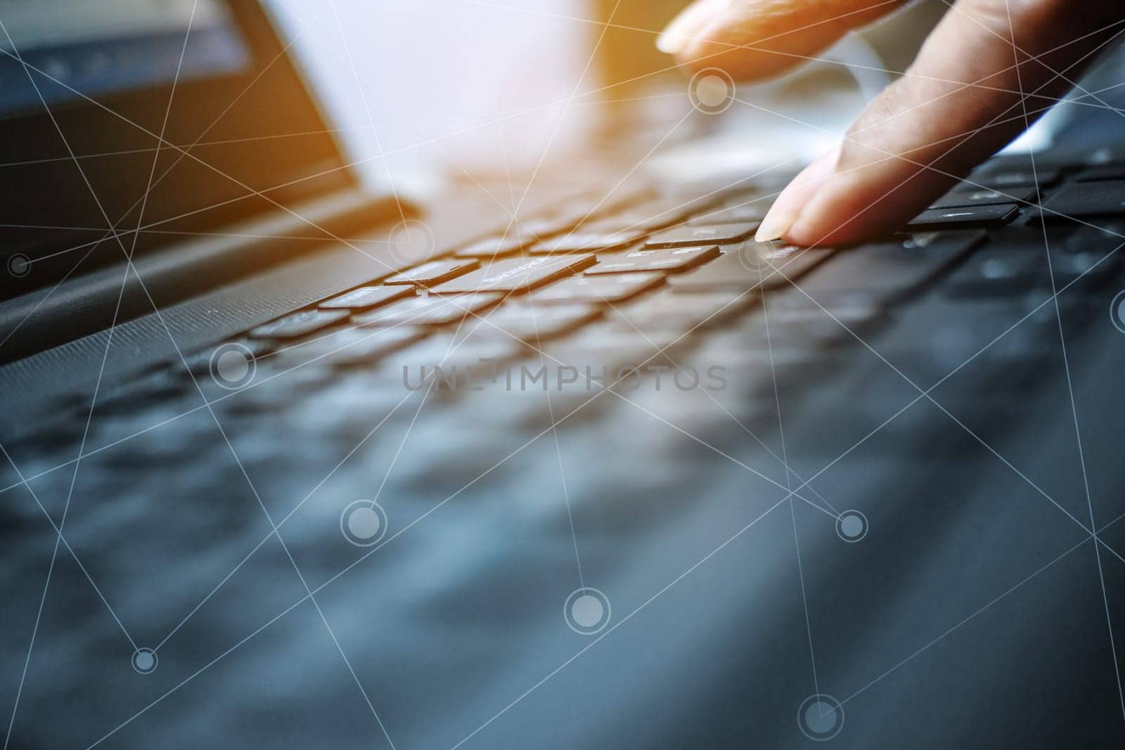 Networking and connecting concept, Keyboard with hand human on notebook computer blurred background