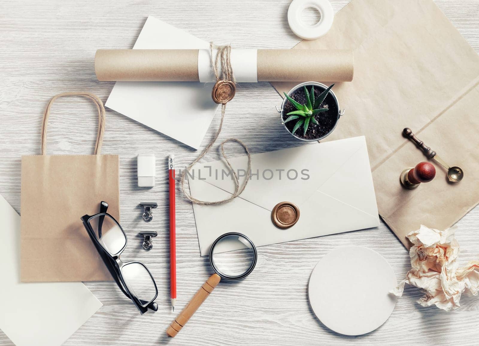 Blank retro stationery template on light wood table background. Mock up for branding identity.