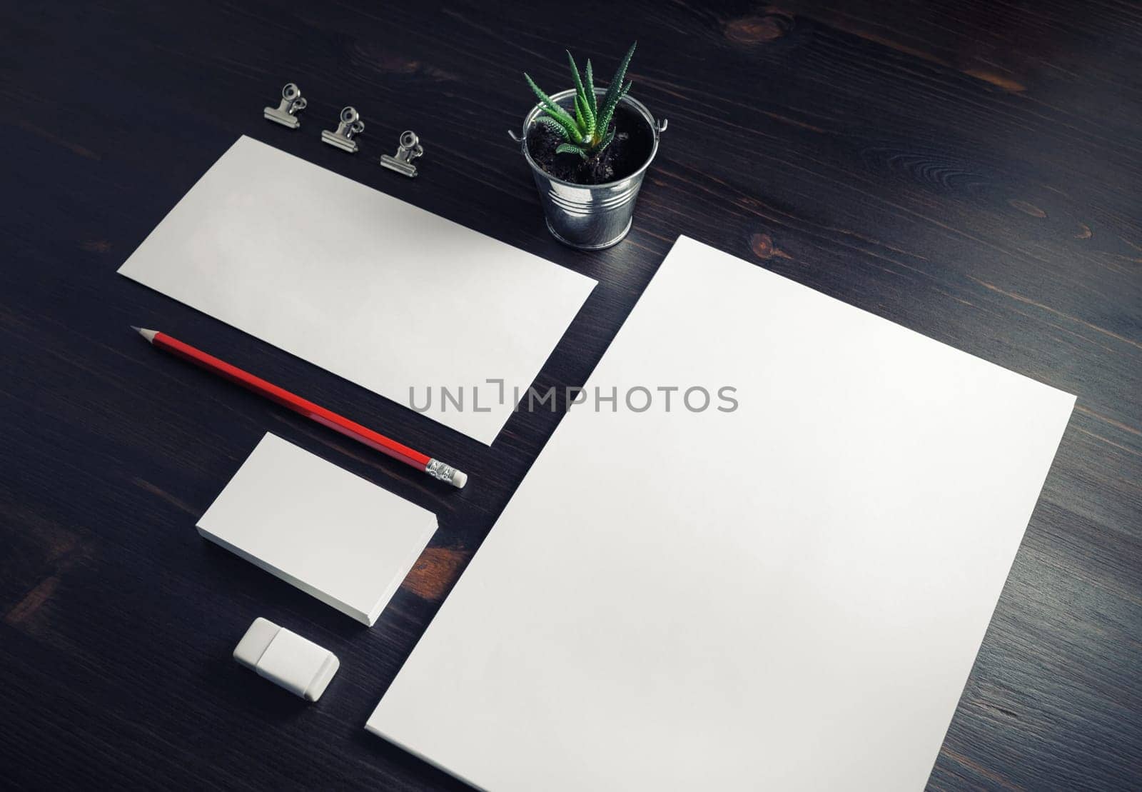 Blank corporate stationery set on wooden background. Template for branding design.