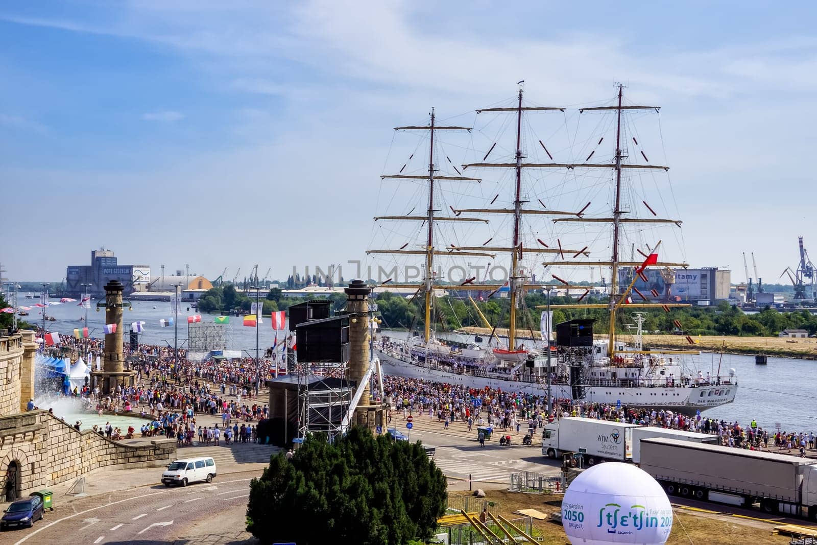 Szczecin, Poland Aug 2013 The Tall Ships Races, tall ship Dar Mlodzierzy in harbour, crowds of tourists celebrating the event