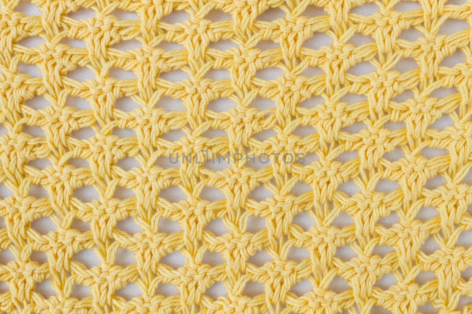 Dark Yellow Knitting Pattern or Knitted Pattern Background in macro style. Knitting Pattern or Knitted Pattern in vintage style for design