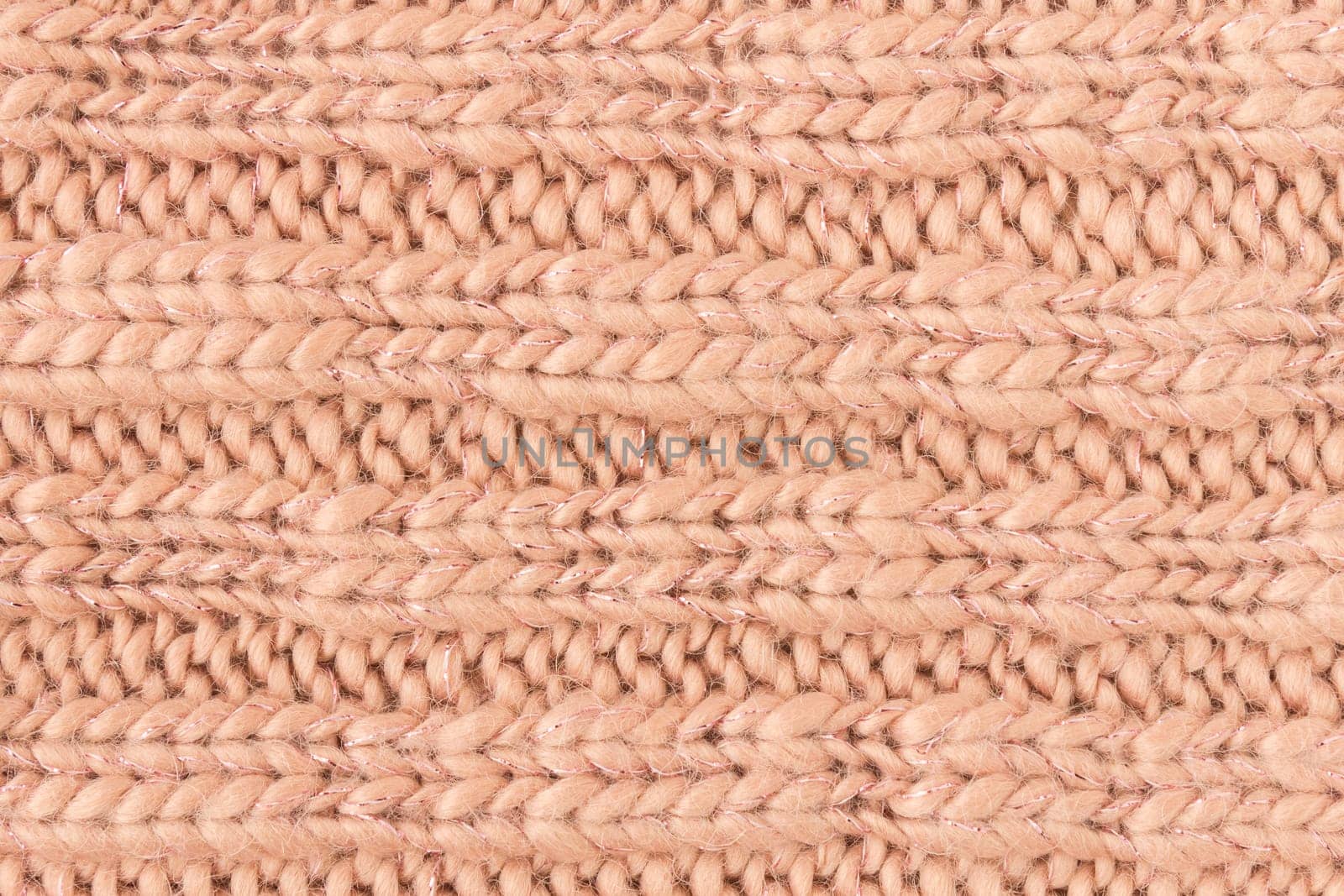 Brown Knitting Texture or Knitted Texture Background in macro style. Knitting Texture or Knitted Texture in vintage style for design