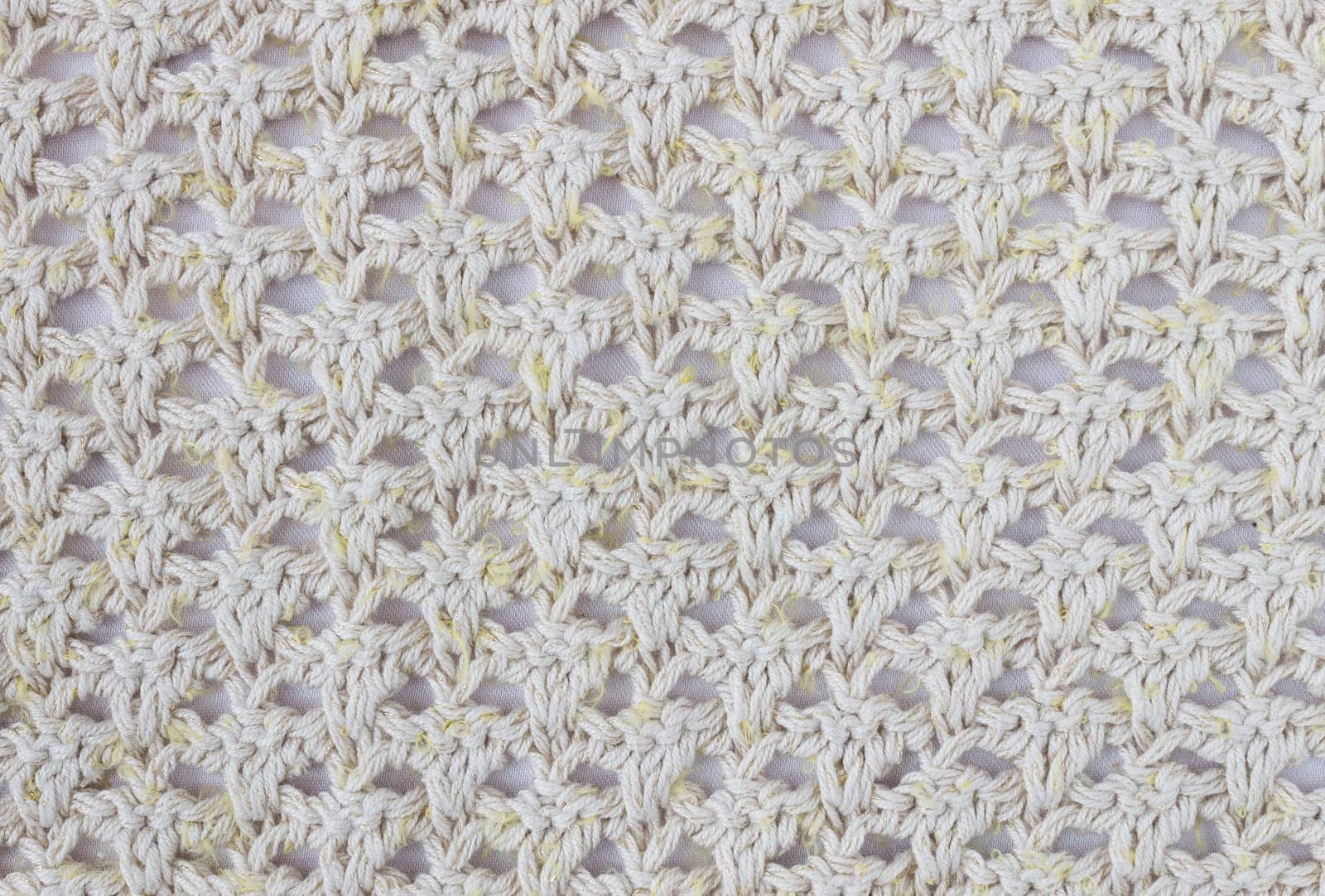 Yellow Knitting Pattern or Knitted Pattern Background in macro style. Knitting Pattern or Knitted Pattern in vintage style for design