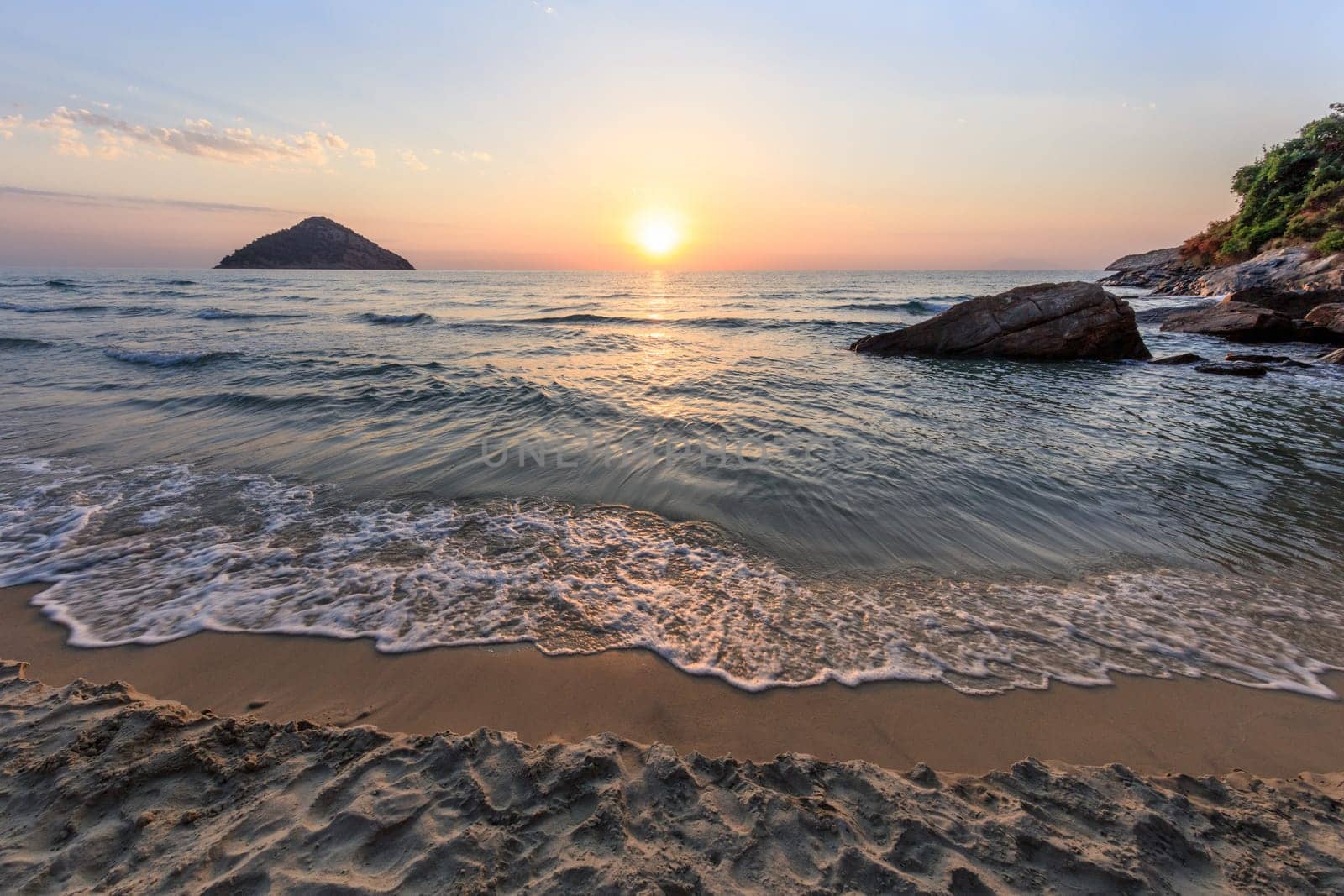 Paradise beach at sunrise. Thassos island Greece