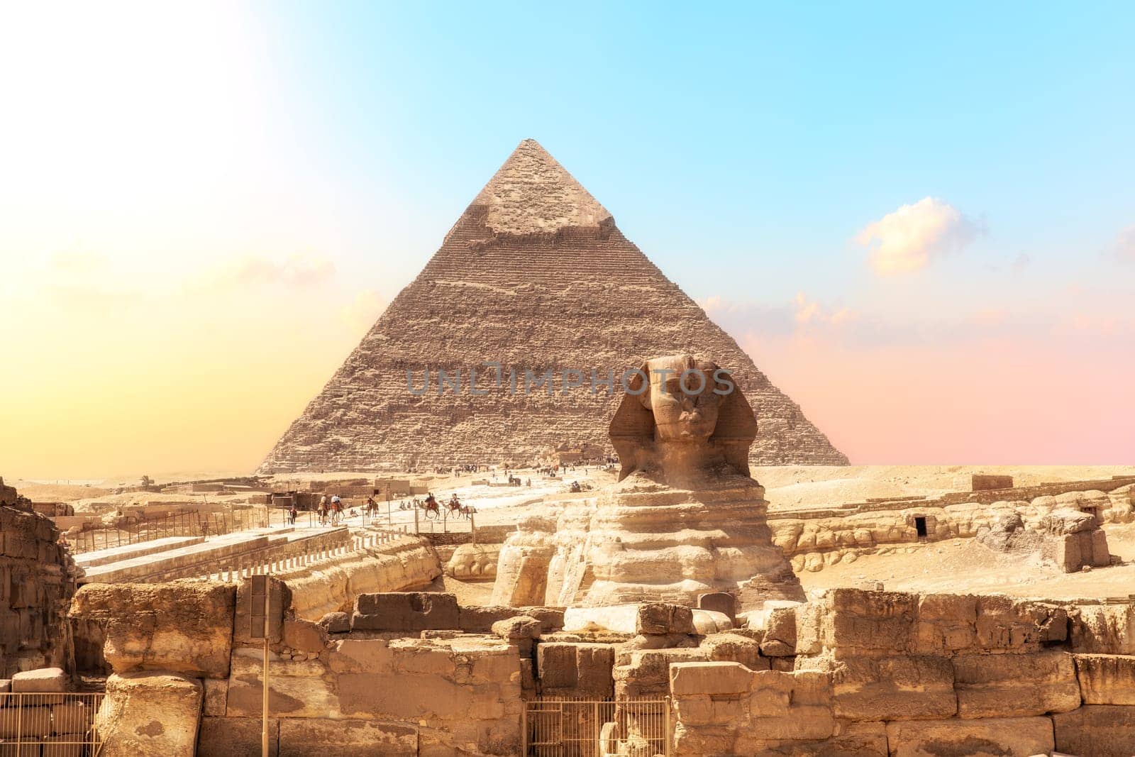 Ruins of the temple of Giza with the Sphinx and the Pyramid of Khafre,  Egypt.