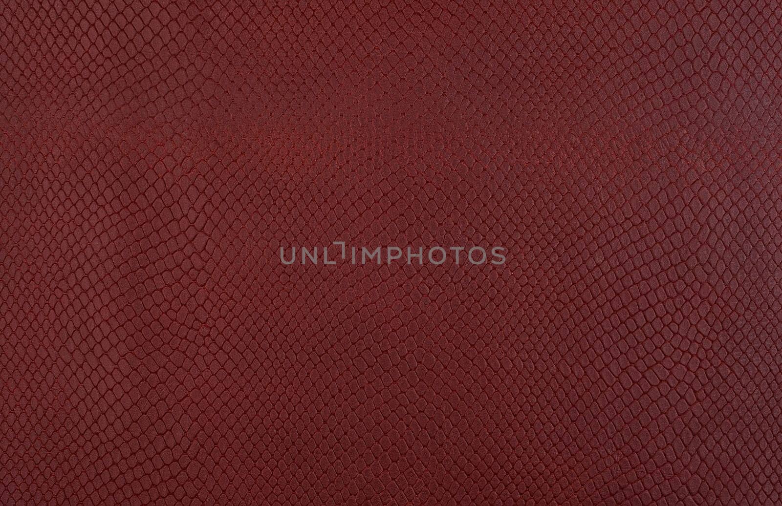 Brown embossed imitation snake skin background