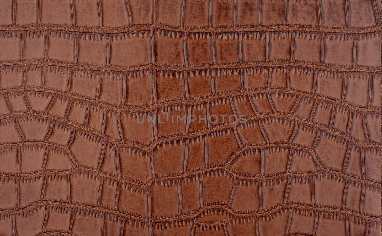 Imitation brown crocodile skin background