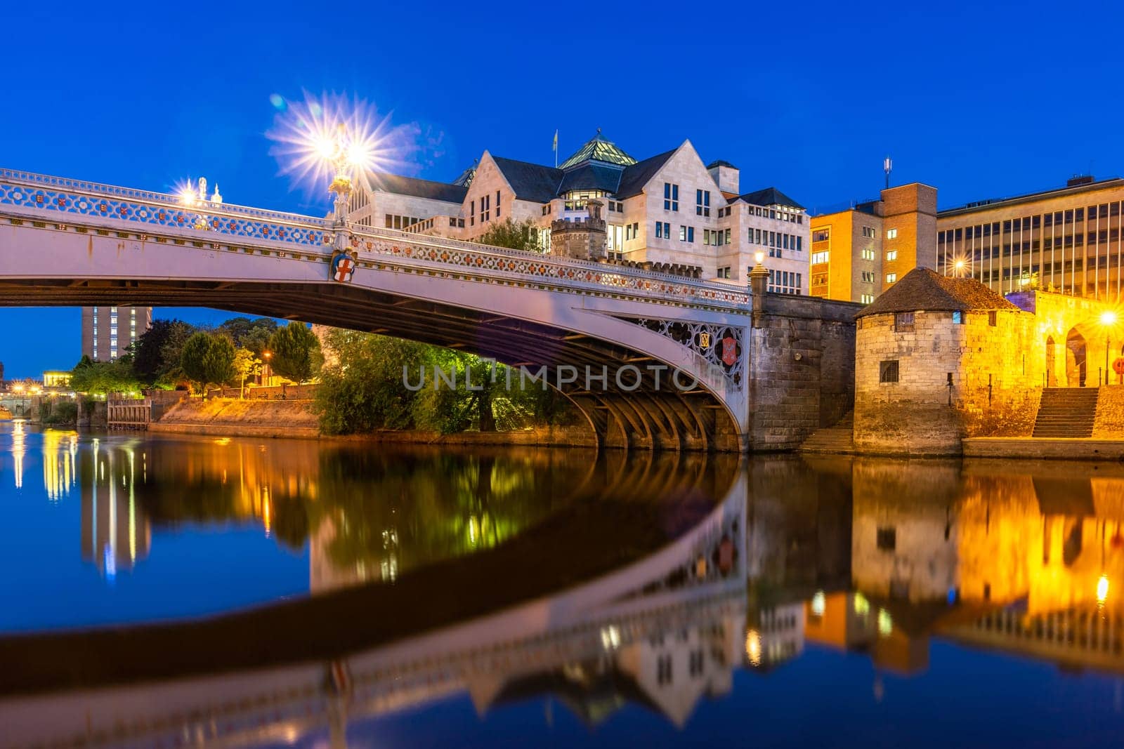 York cityscape along river ouse sunset dusk, York Yorkshire England UK.