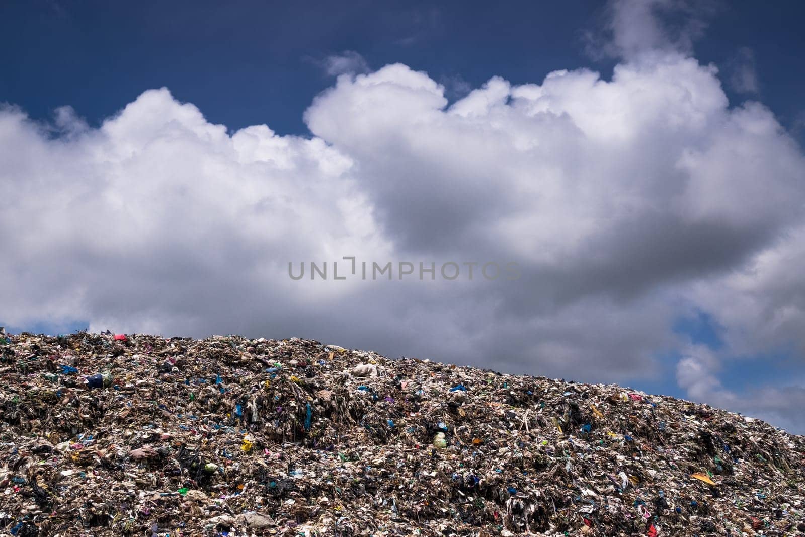 Landfill With Cumulus Clouds, landscape with garbage dump