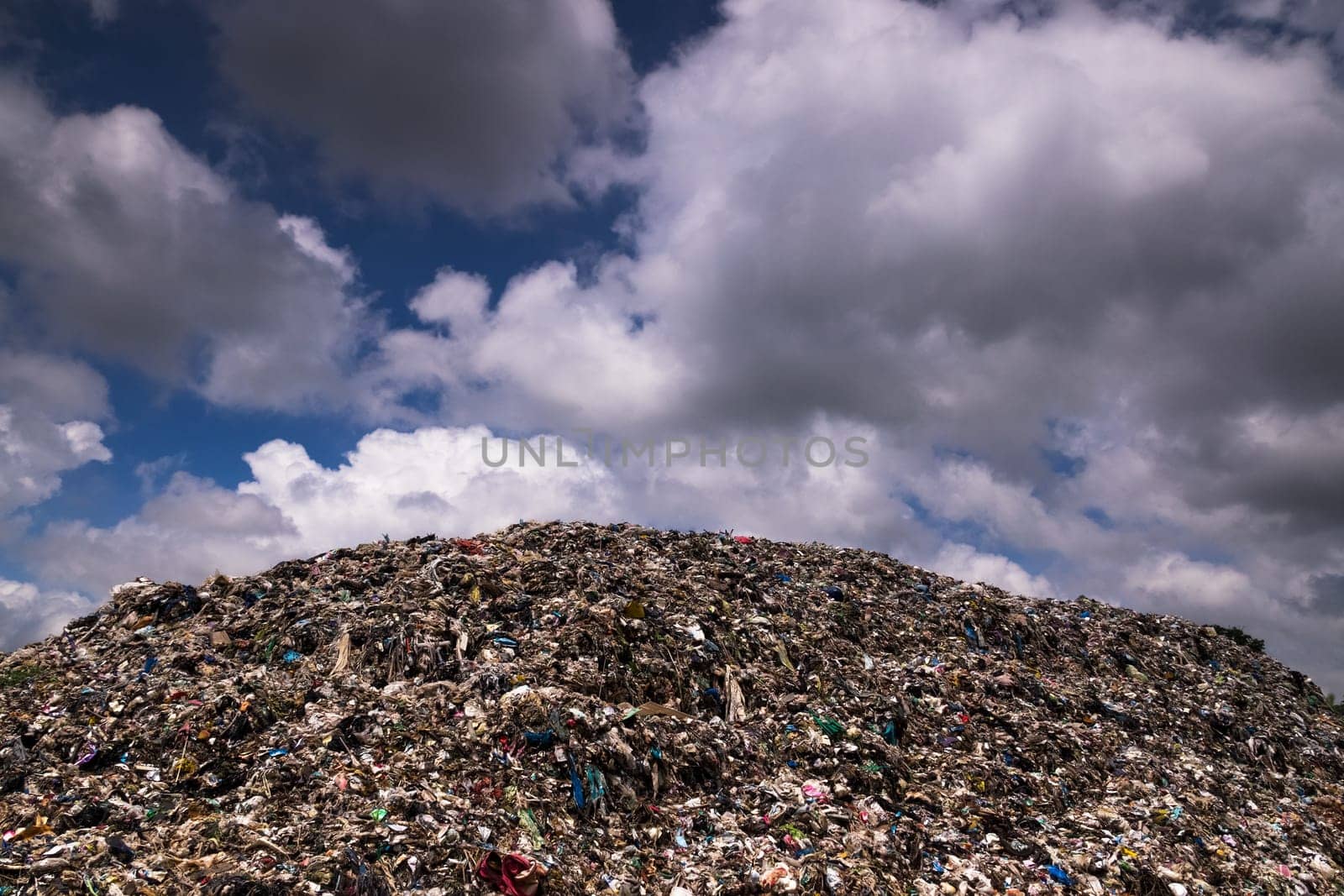 Landfill With Cumulus Clouds, landscape with garbage dump