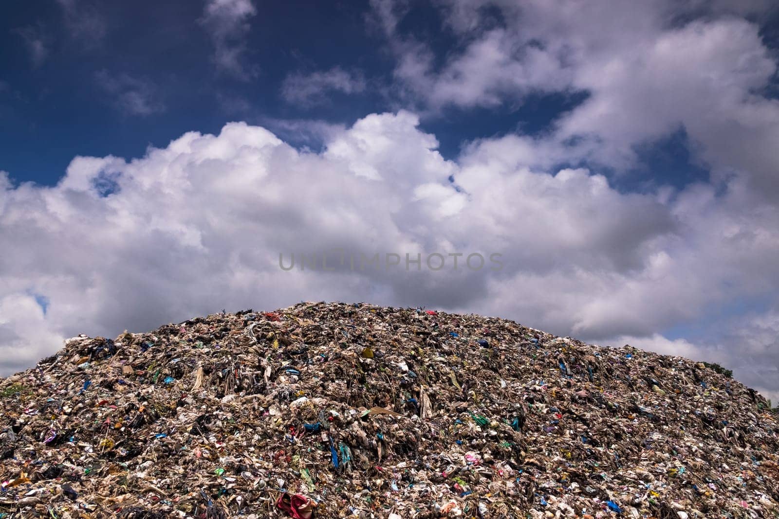 Landfill With Cumulus Clouds, landscape with garbage dump