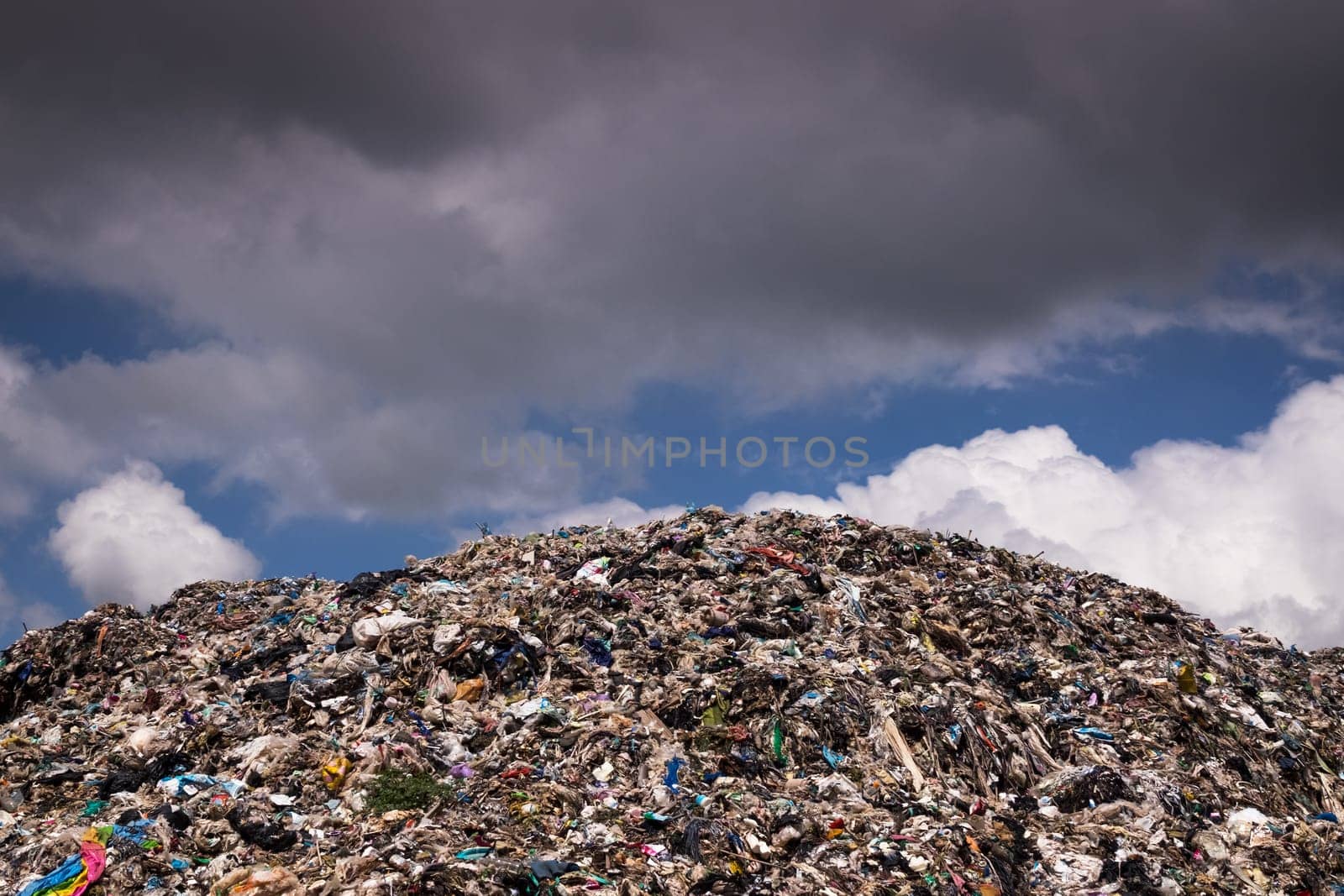 Landfill With Cumulus Clouds, landscape with garbage dump