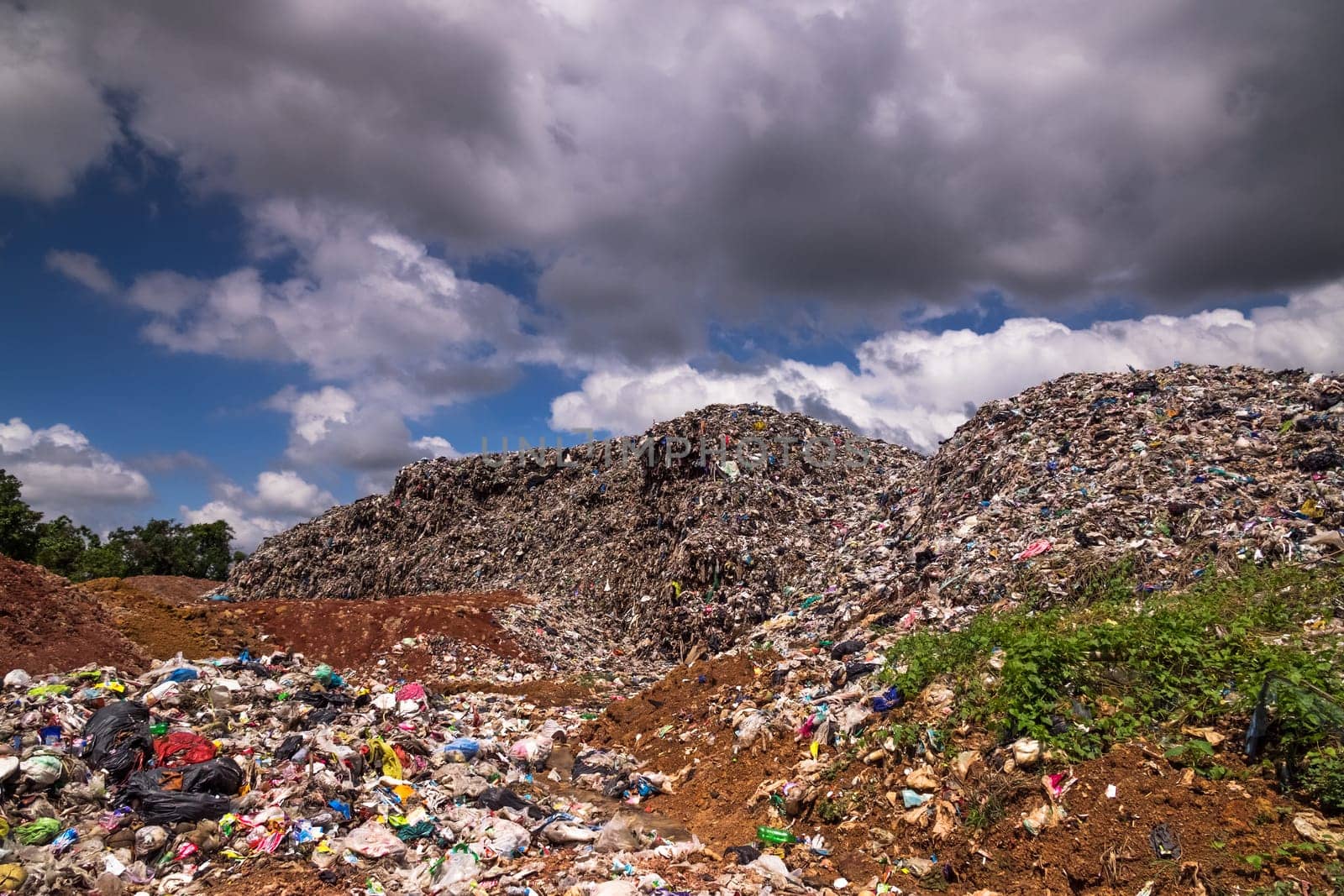 Landfill With Cumulus Clouds, landscape with garbage dump