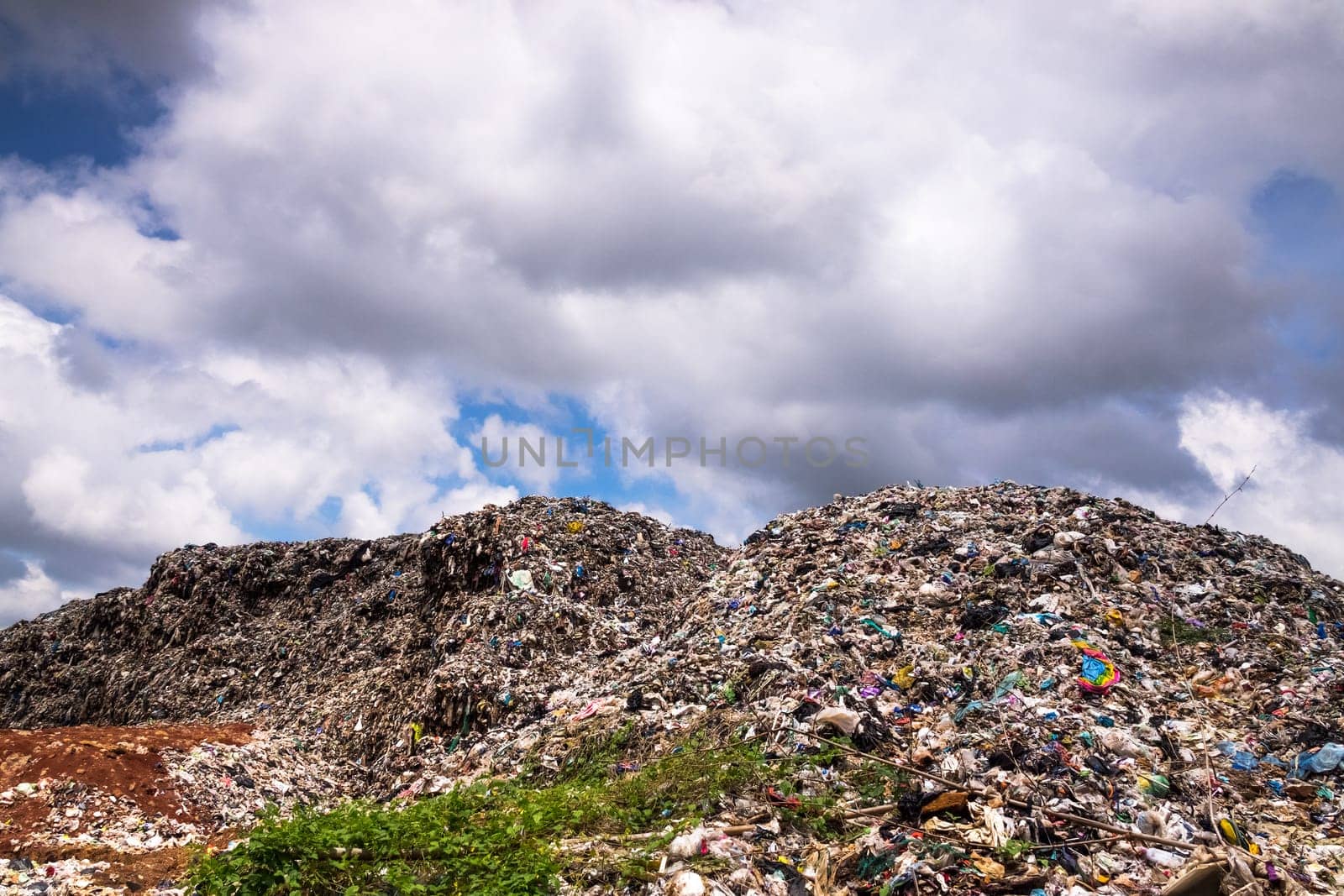 Landfill With Cumulus Clouds, landscape with garbage dump