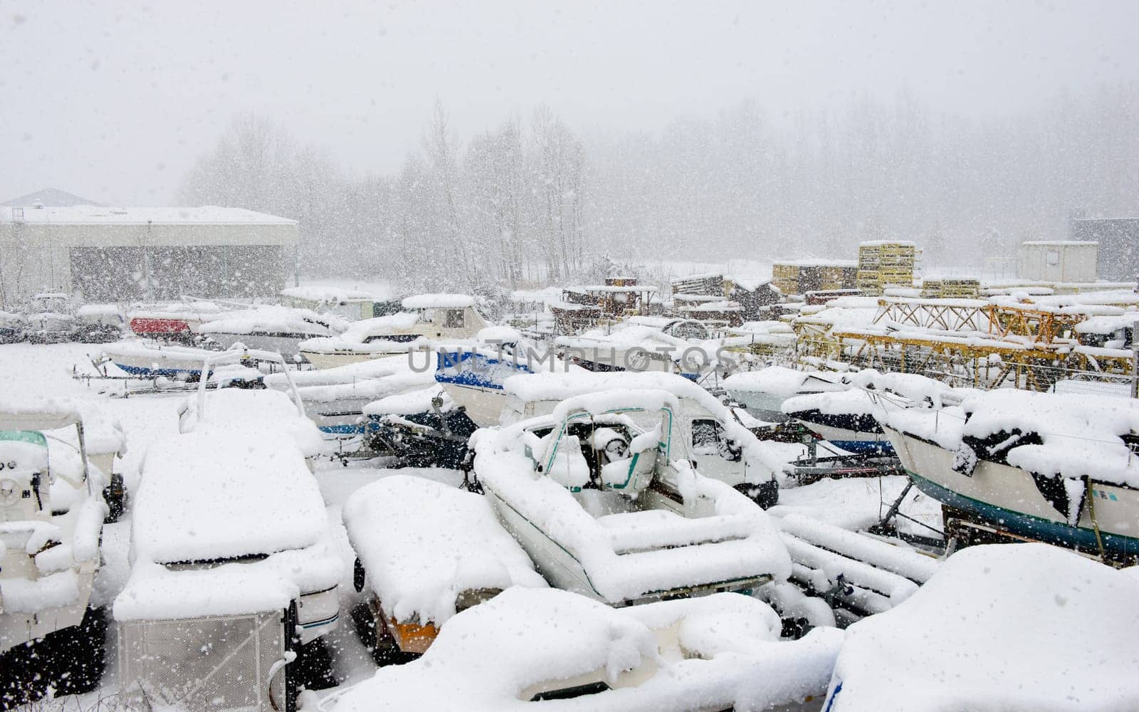 pleasure boats under snow in a parc