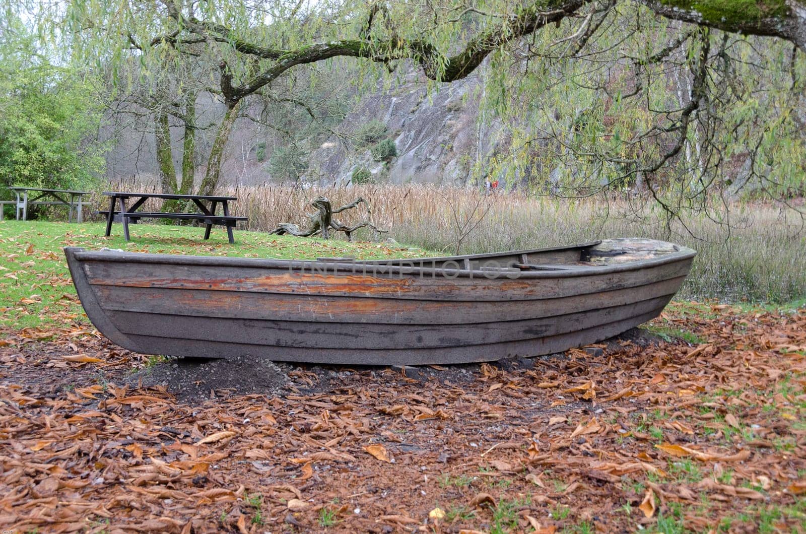 Old rowboat standing on land