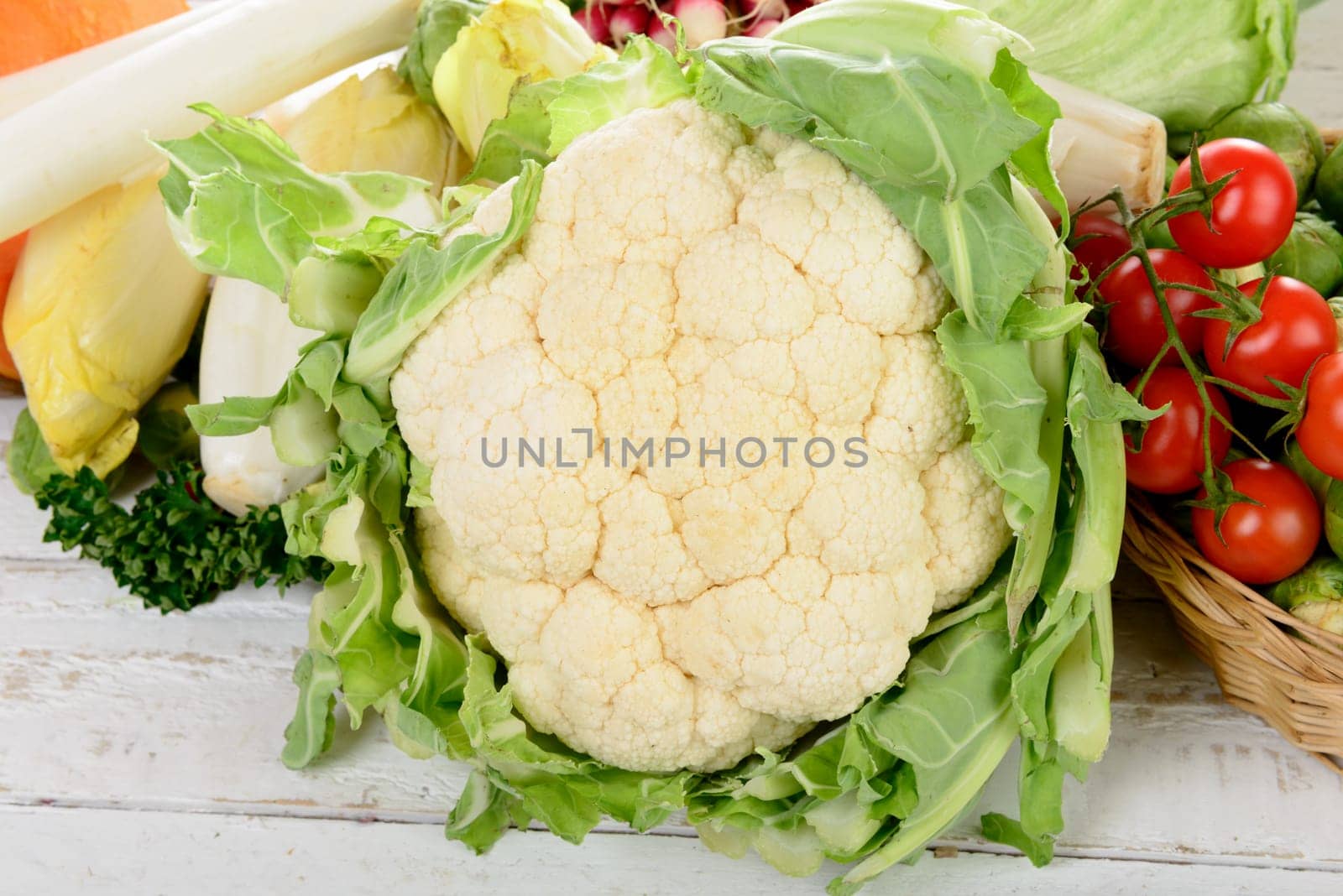 cauliflower and various vegetables on the vintage table