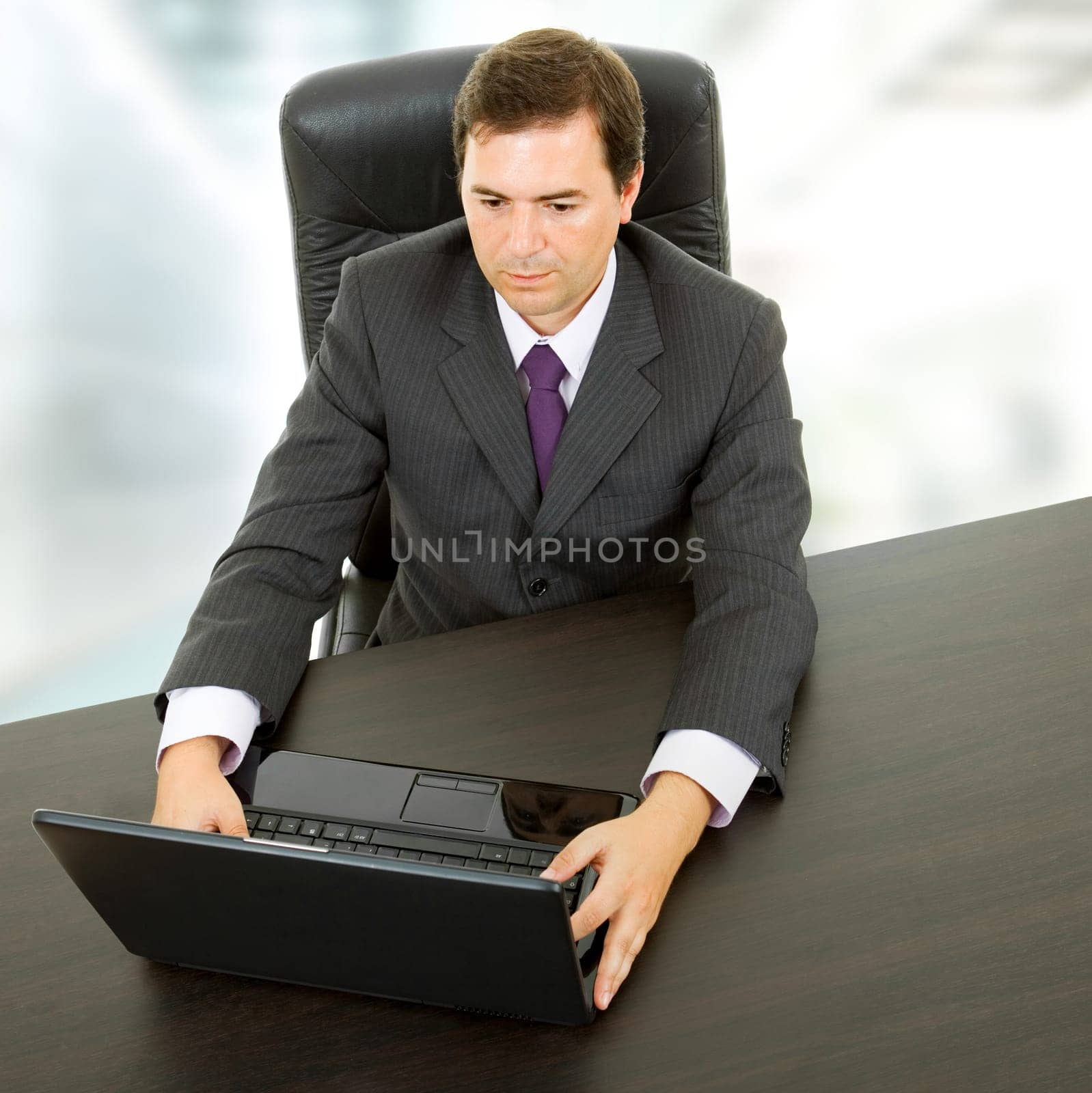 young business man working with is laptop