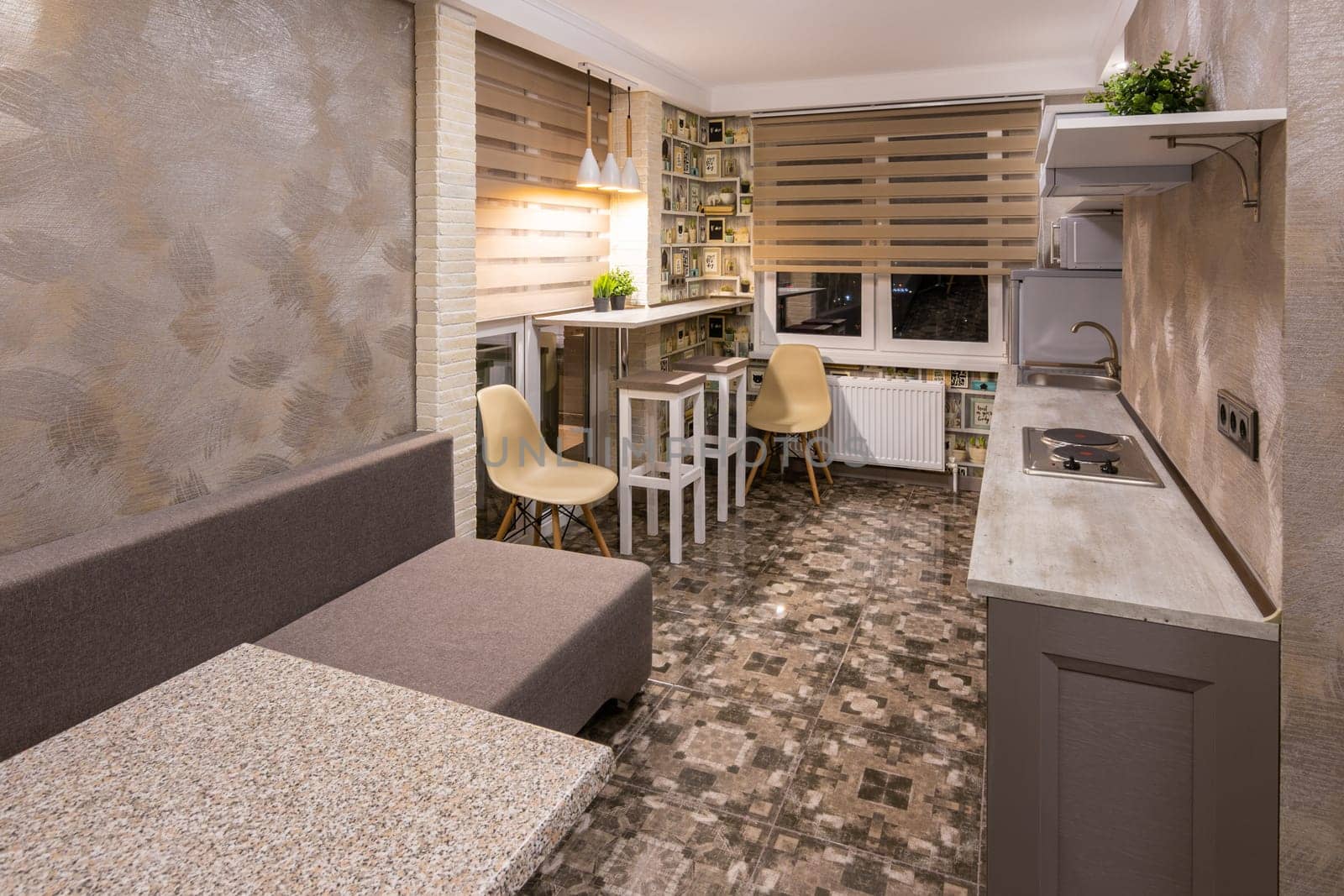 Anapa, Russia - June 27, 2019: Interior combined small living room and kitchen