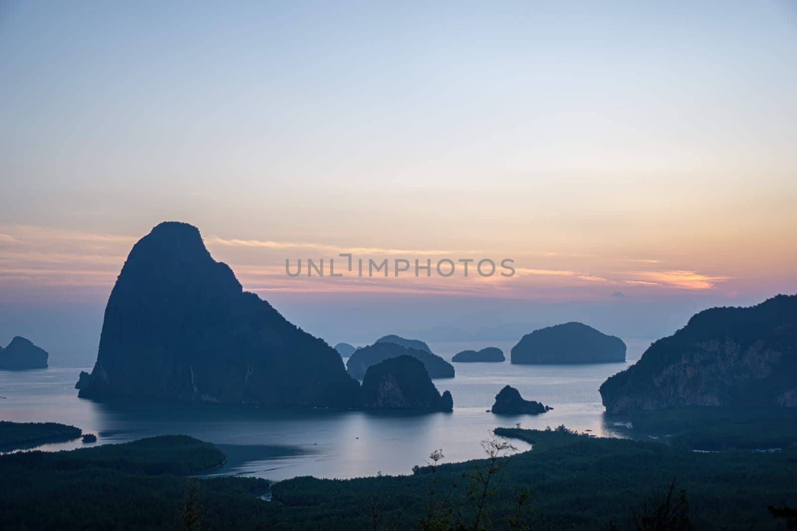 Morning sunrise. Mountains in the Andaman Sea..March 2019: Samed Nang Phi Phang Nga, Thailand