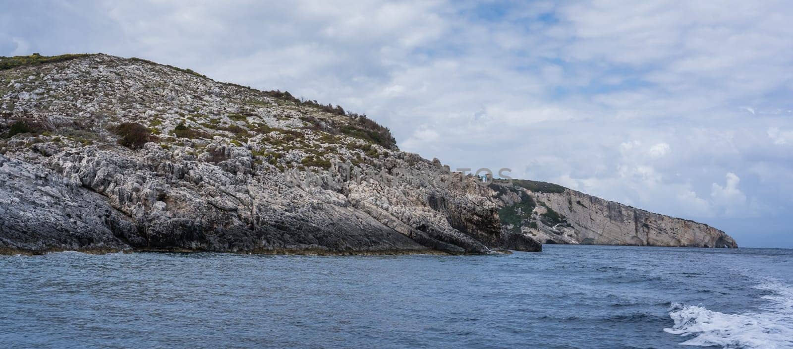 Coastline cliffs near Blue Caves as seen from a tourist boat, Zante Island, Greece