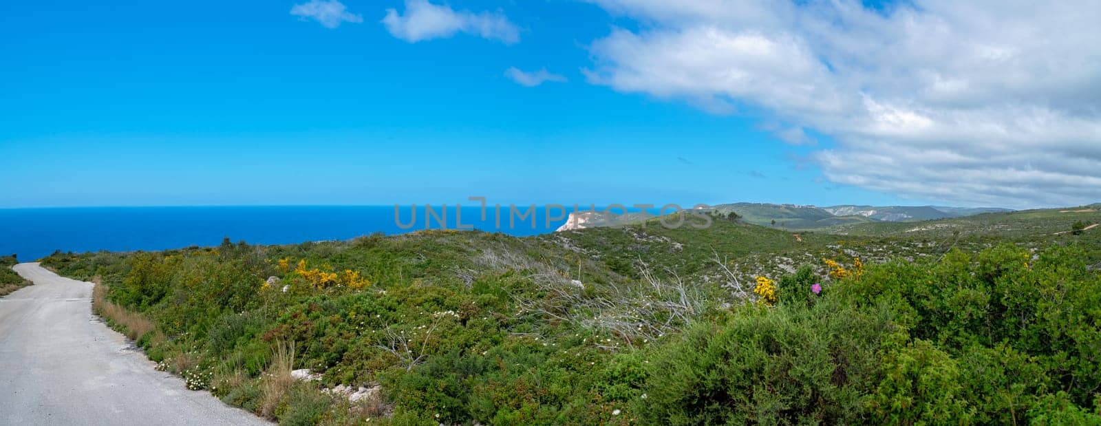 Mediterranean sea as seen from the road leading towards the coast and shore on Zante Island, Greece