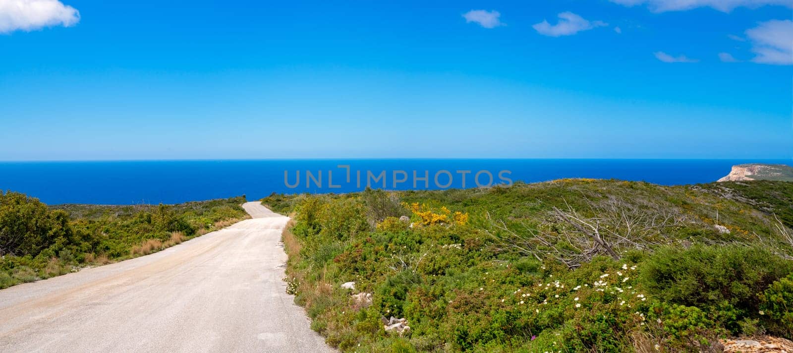 Mediterranean sea as seen from the road leading towards the coast and shore on Zante Island, Greece
