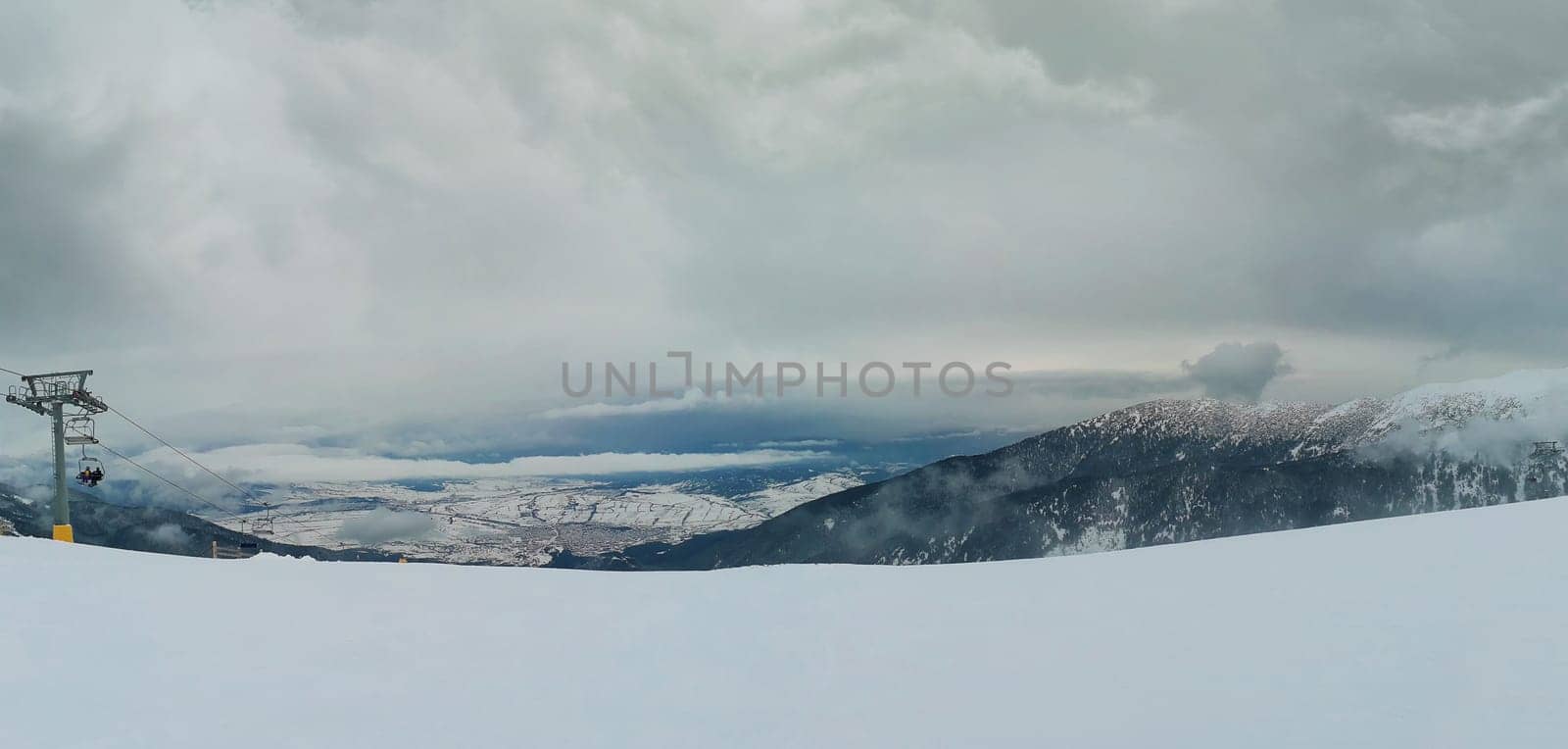 Bansko resort panoramic view with ski slope, view from the top of the mountain, Bulgaria.