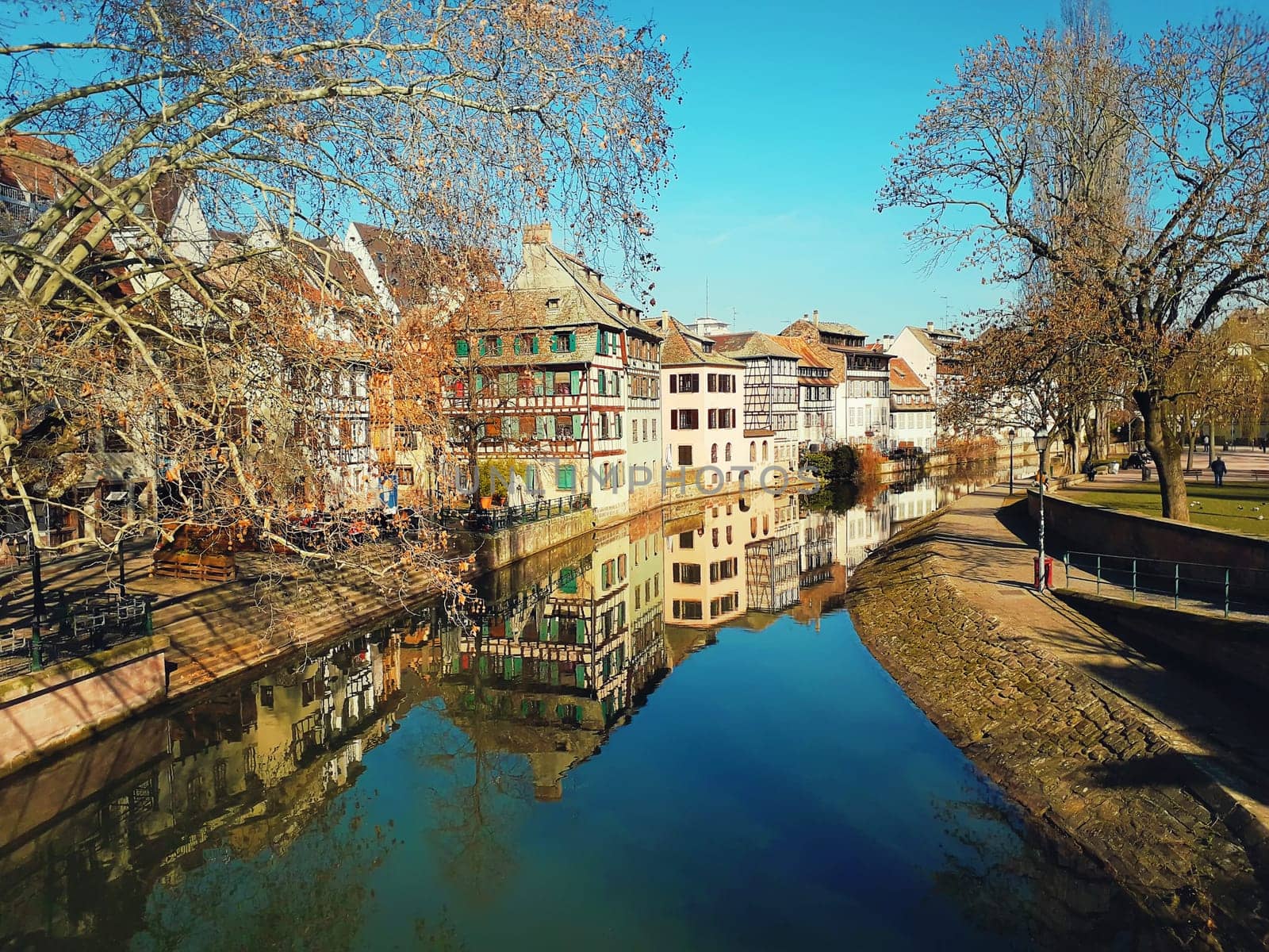 Traditional half-timbered houses on picturesque canals in La Petite France, the medieval fairytale town of Strasbourg, UNESCO World Heritage Site, Alsace, France.