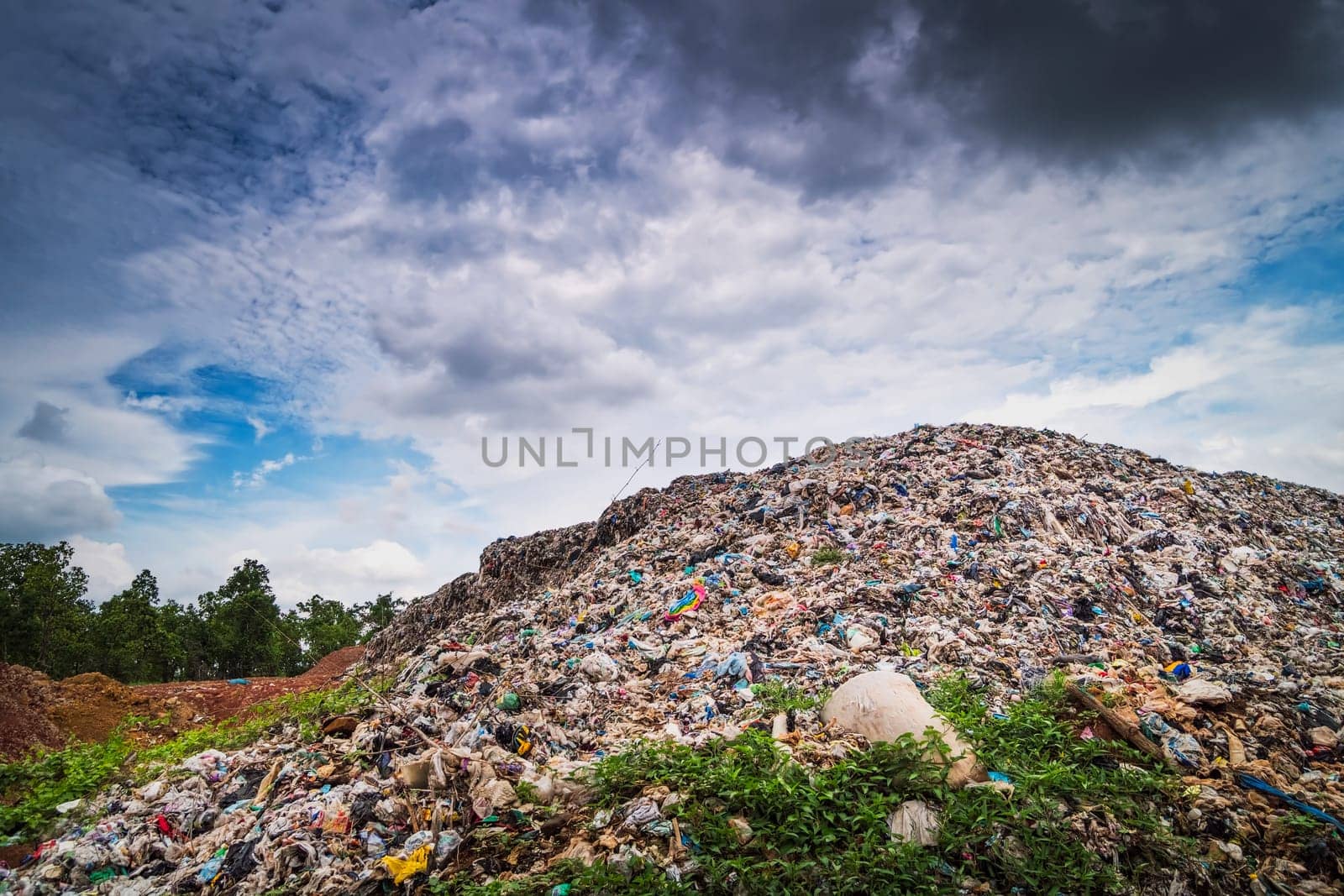 Garbage Dump Hill, landscape with landfill and clouds